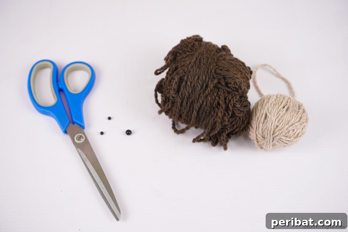 Adorable Pom Pom Hedgehog Fall Craft for Kids 8 Skeins of dark and light brown yarn on a white table next to blue scissors