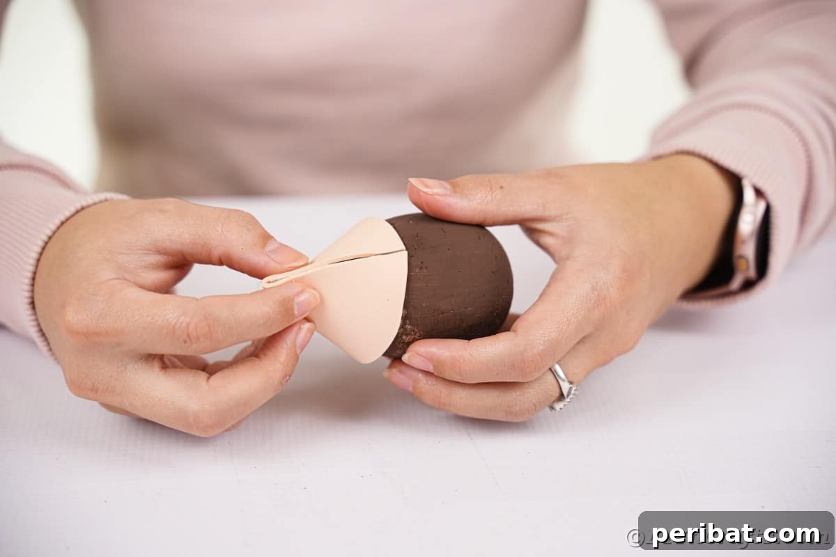 Rustic Foam Hedgehog: An Easy Autumn Craft for Kids 12 Gluing the tan paper to the brown egg