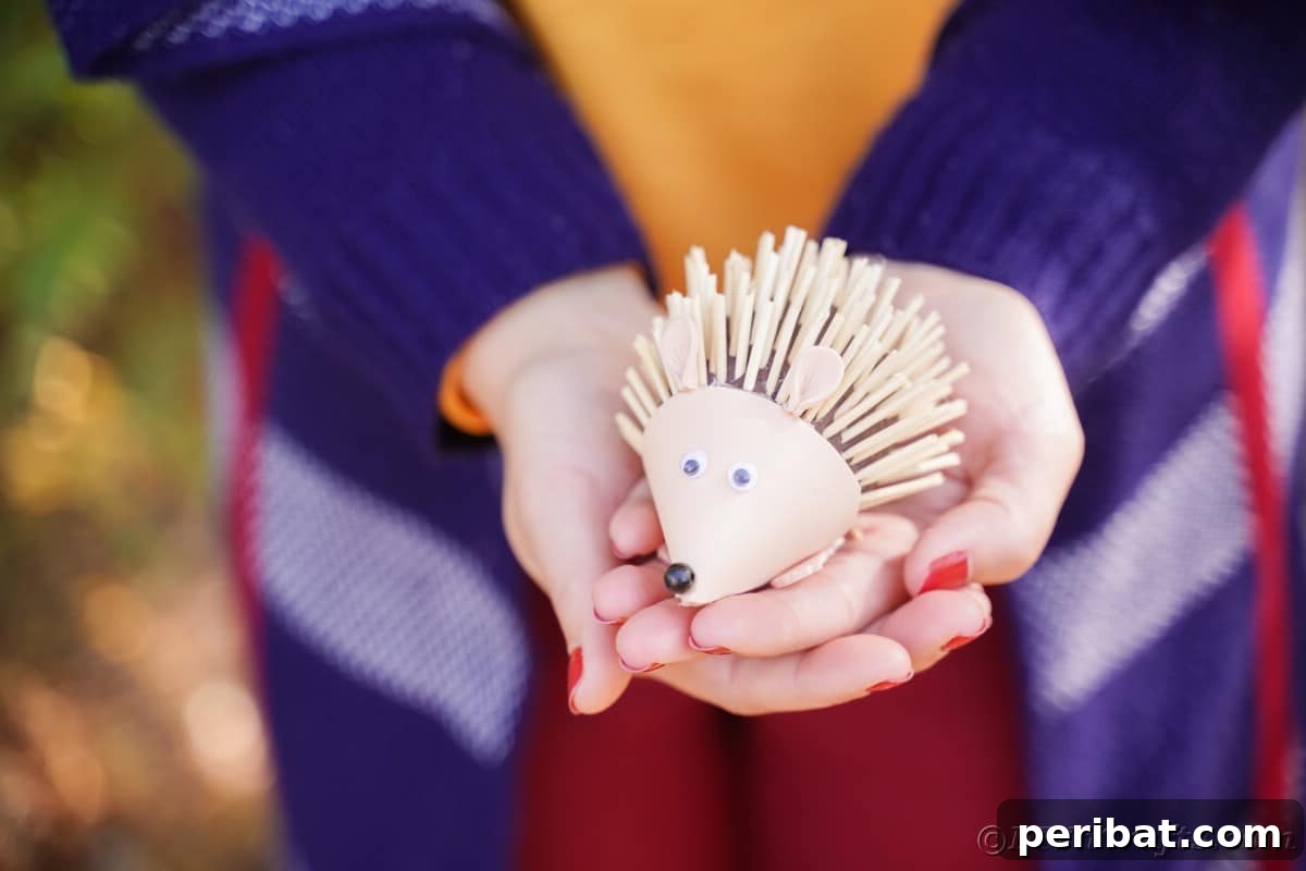 Rustic Foam Hedgehog: An Easy Autumn Craft for Kids 3 Foam hedgehog in hands of woman in orange shirt