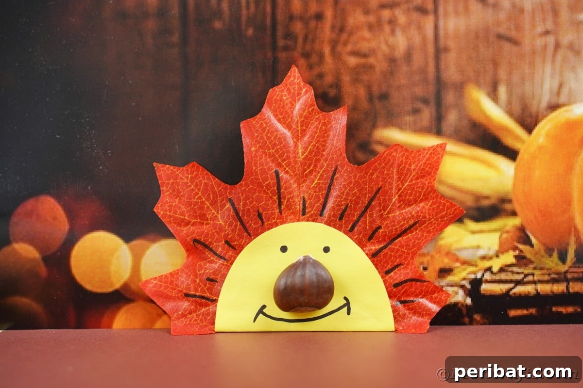 Smiling leaf face in front of pumpkin banner for fall decor