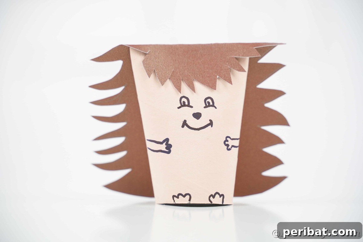 Charming Toilet Paper Roll Hedgehogs for Autumn 2 Paper roll hedgehog sitting on white table