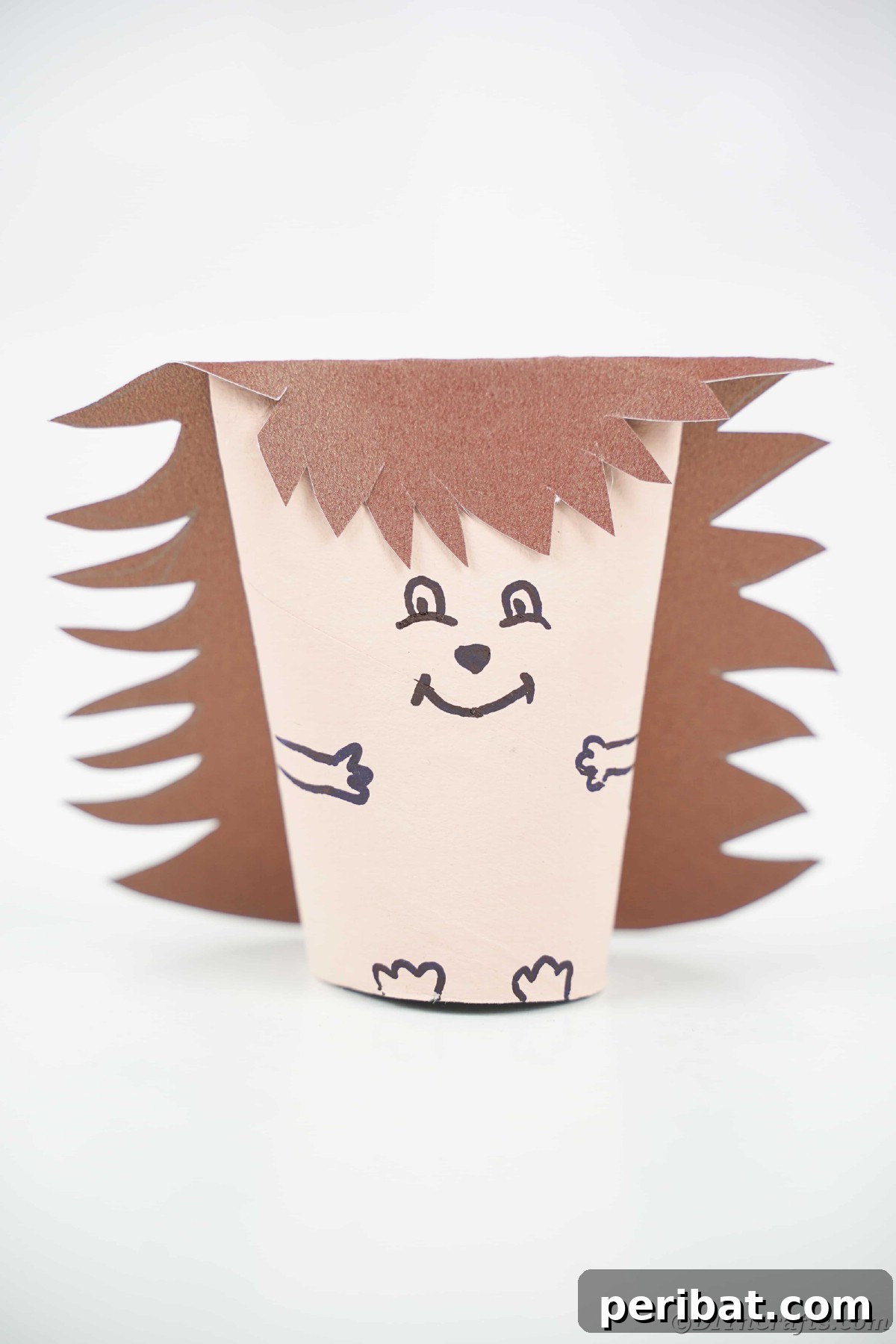 Charming Toilet Paper Roll Hedgehogs for Autumn 18 Brown painted toilet paper roll hedgehog on white table