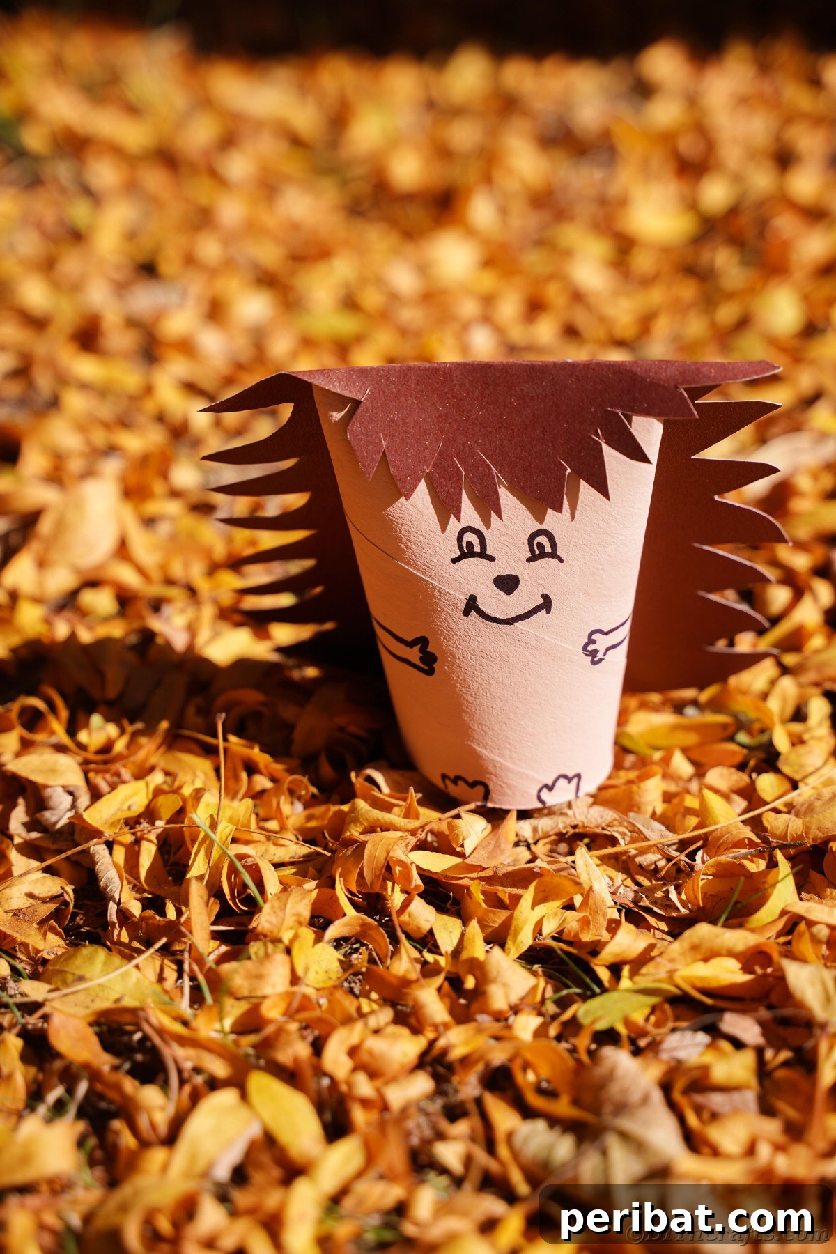 Charming Toilet Paper Roll Hedgehogs for Autumn 9 Fallen yellow leaves with paper hedgehog in middle