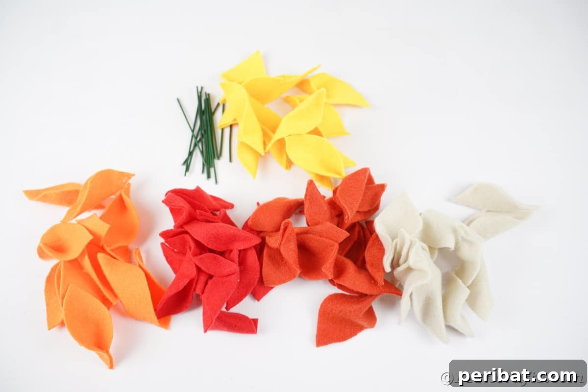 Piles of felt leaves on white counter