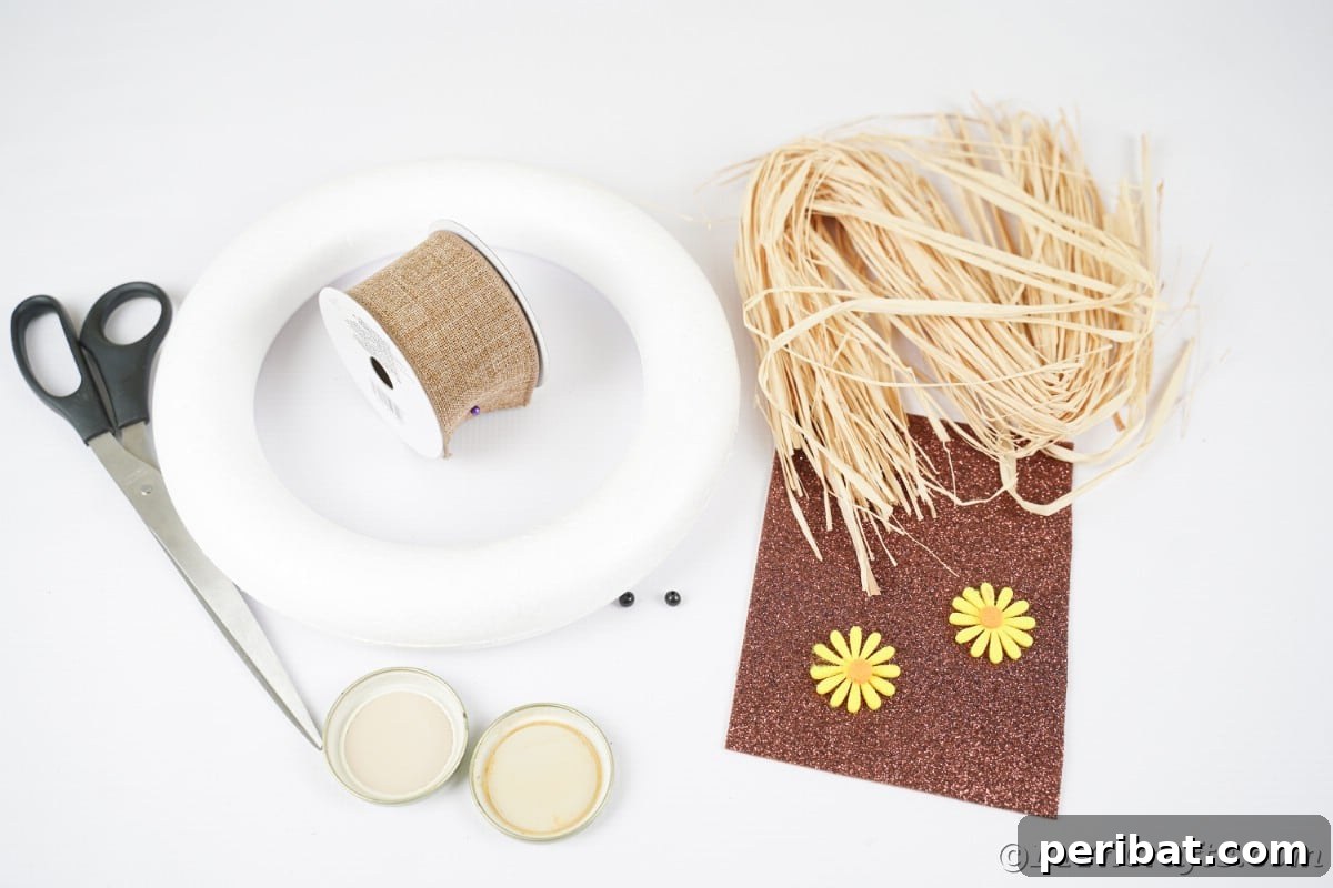 Farmhouse Burlap Owl Wreath 8 Foam wreath form raffia paper and ribbon on white table, showing materials ready for a DIY owl wreath