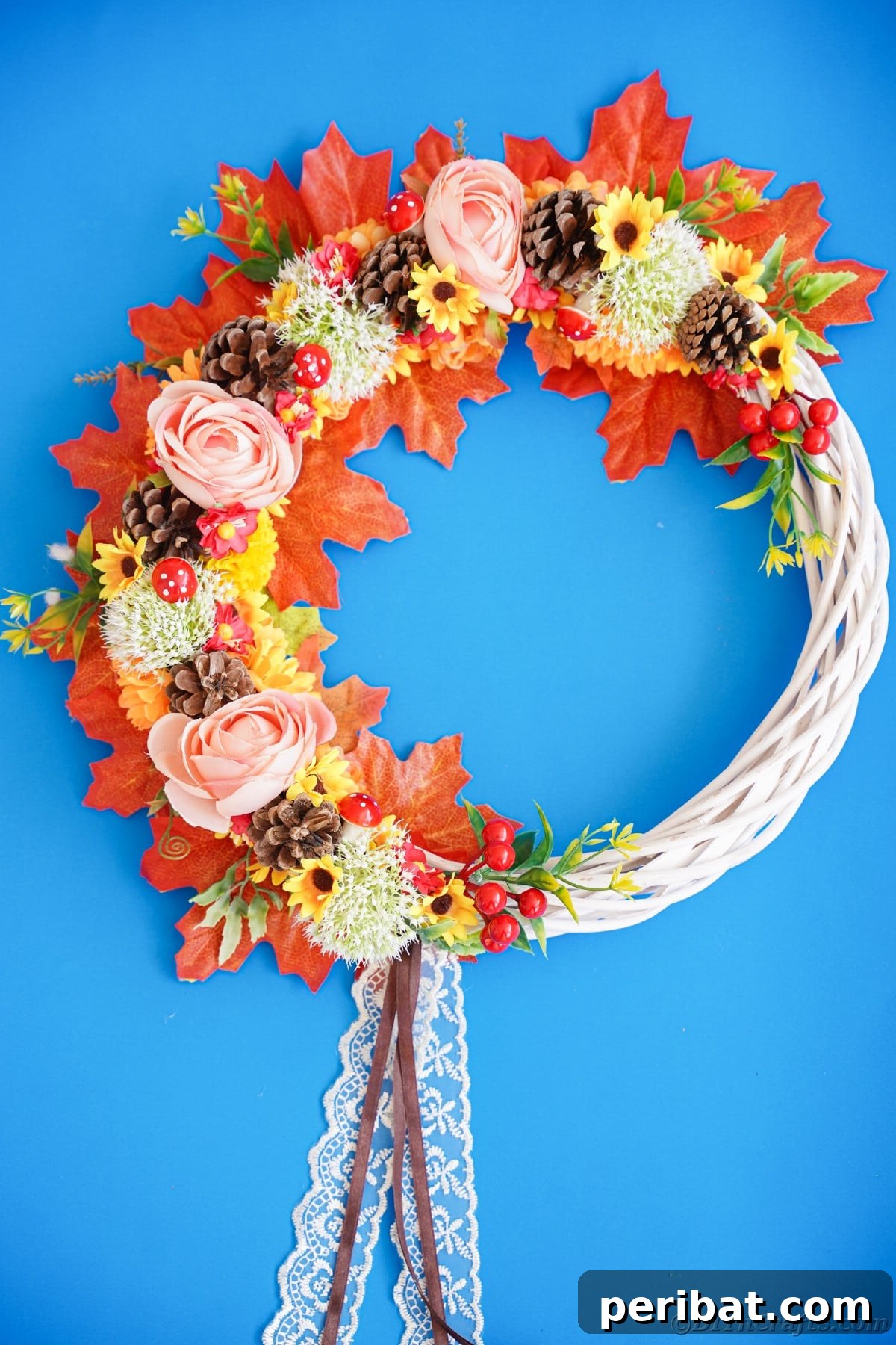 Charming Fall Blossom & Pinecone Wreath 2 White grapevine wreath with fake leaves and flowers