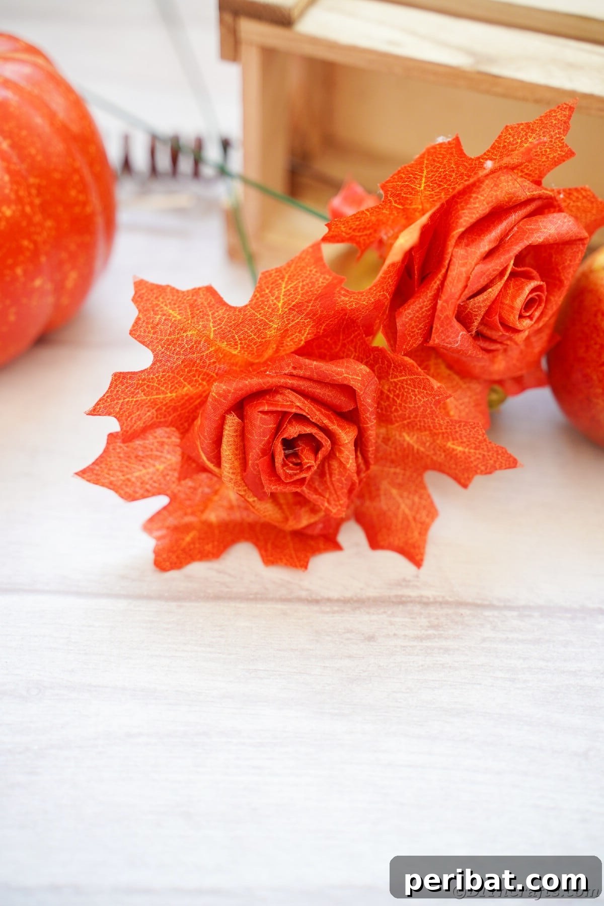 Elegant Autumn Rose Displays Crafted from Faux Foliage 20 Artificial rose by wood crate on white table