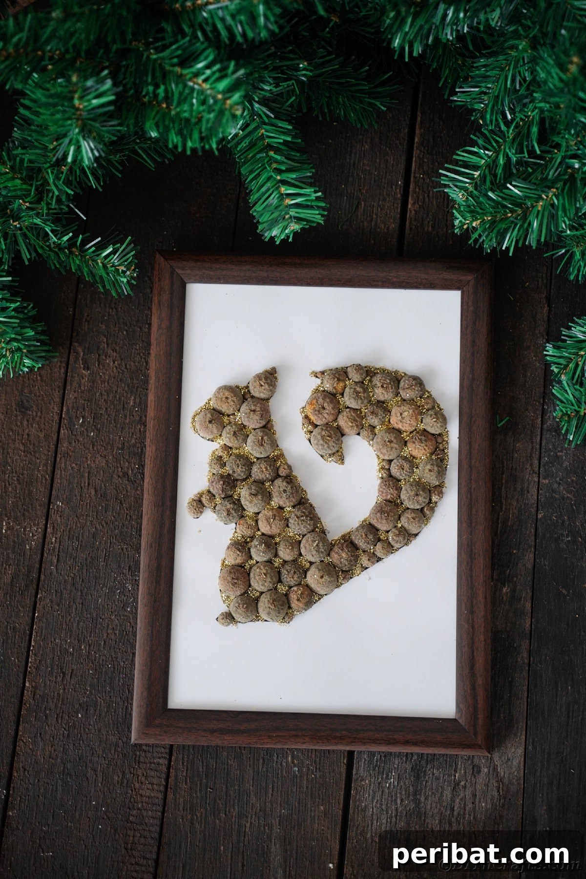 Charming Framed Squirrel with Acorn Cap Wall Decor 16 Acorn cap squirrel in frame on wood table with holiday garland