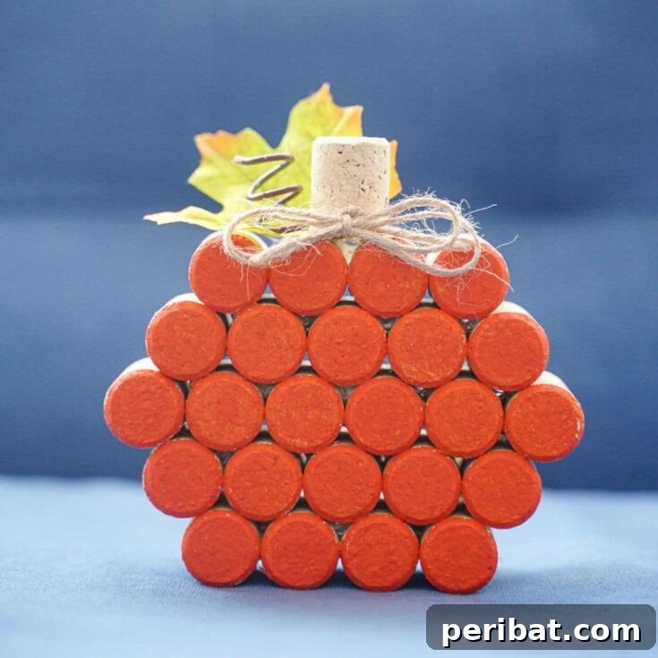 cork pumpkin in front of blue sofa