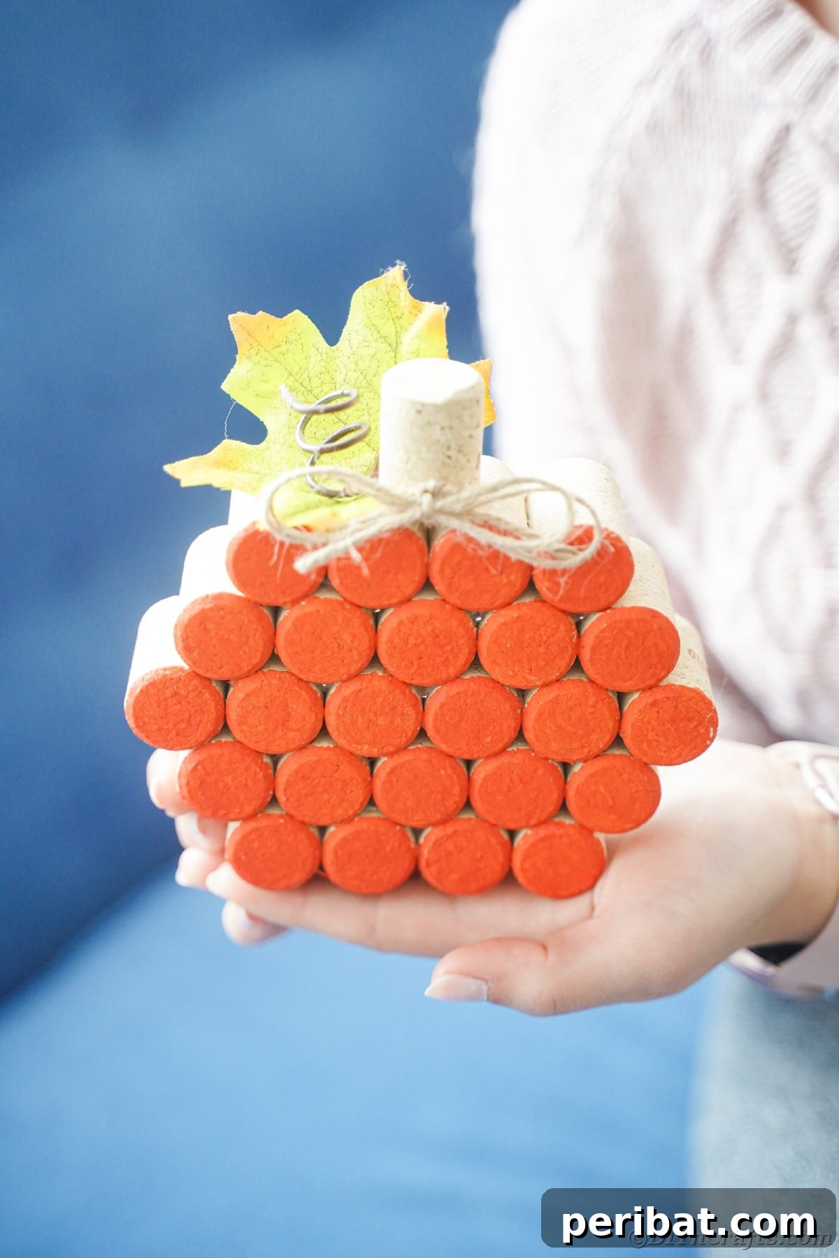 Charming Rustic Wine Cork Pumpkin Creation 21 wine cork pumpkin being held by woman in pink