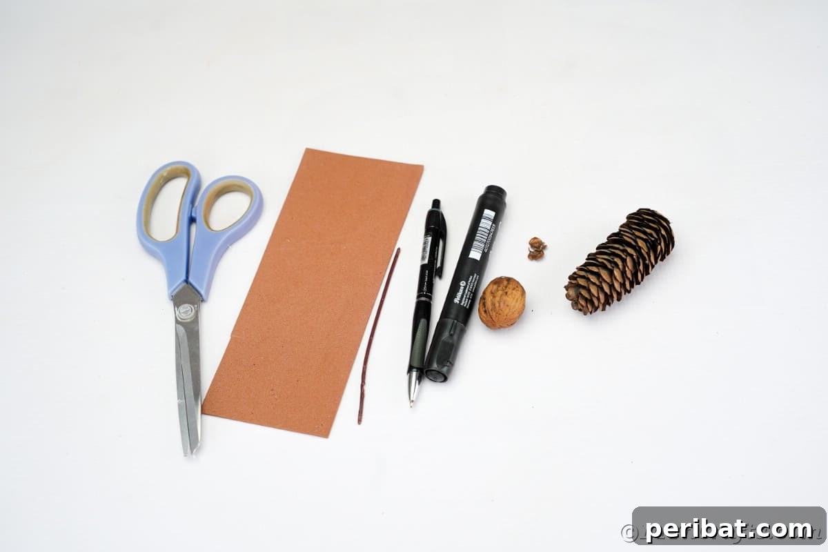 Adorable Pinecone and Pecan Mice Craft 7 scissors brown paper markers pecan and pinecone on white table