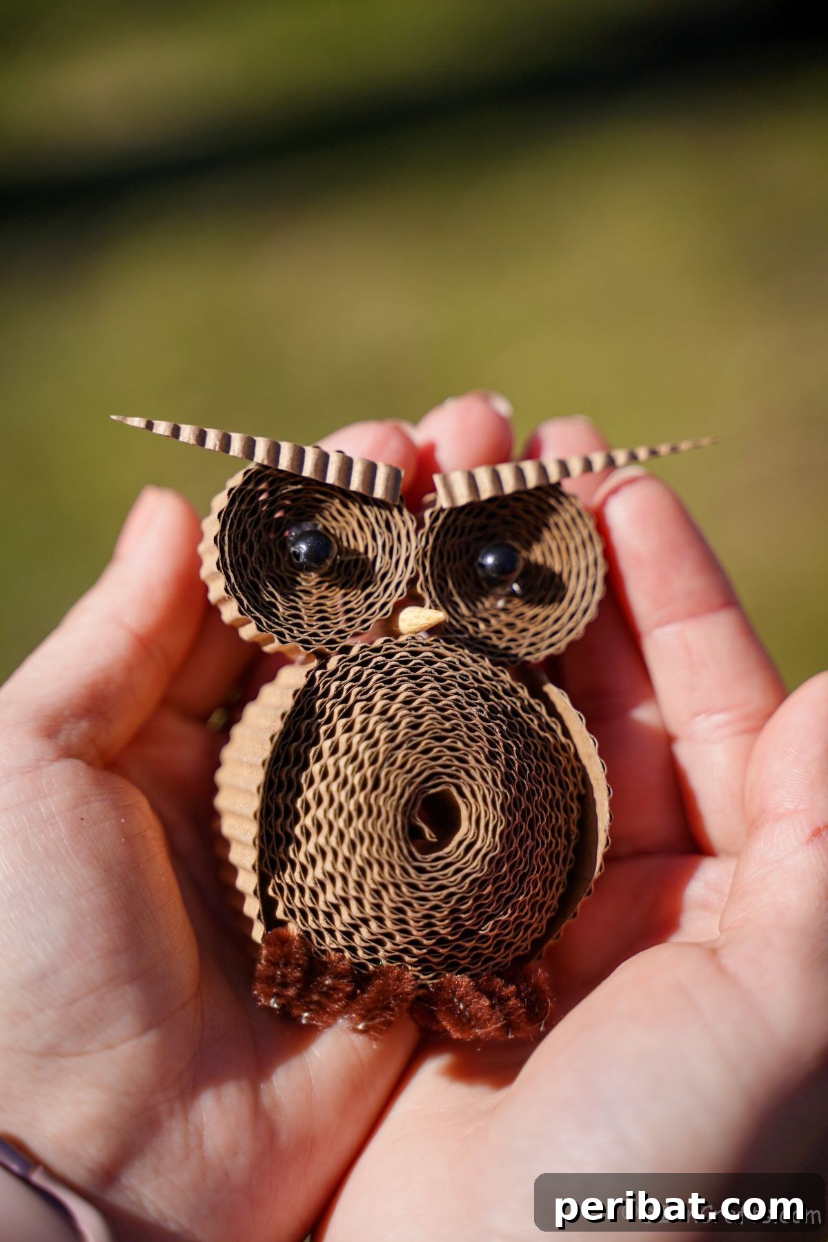 Rustic Rolled Cardboard Owl Art 26 rolled cardboard owl being held in hands