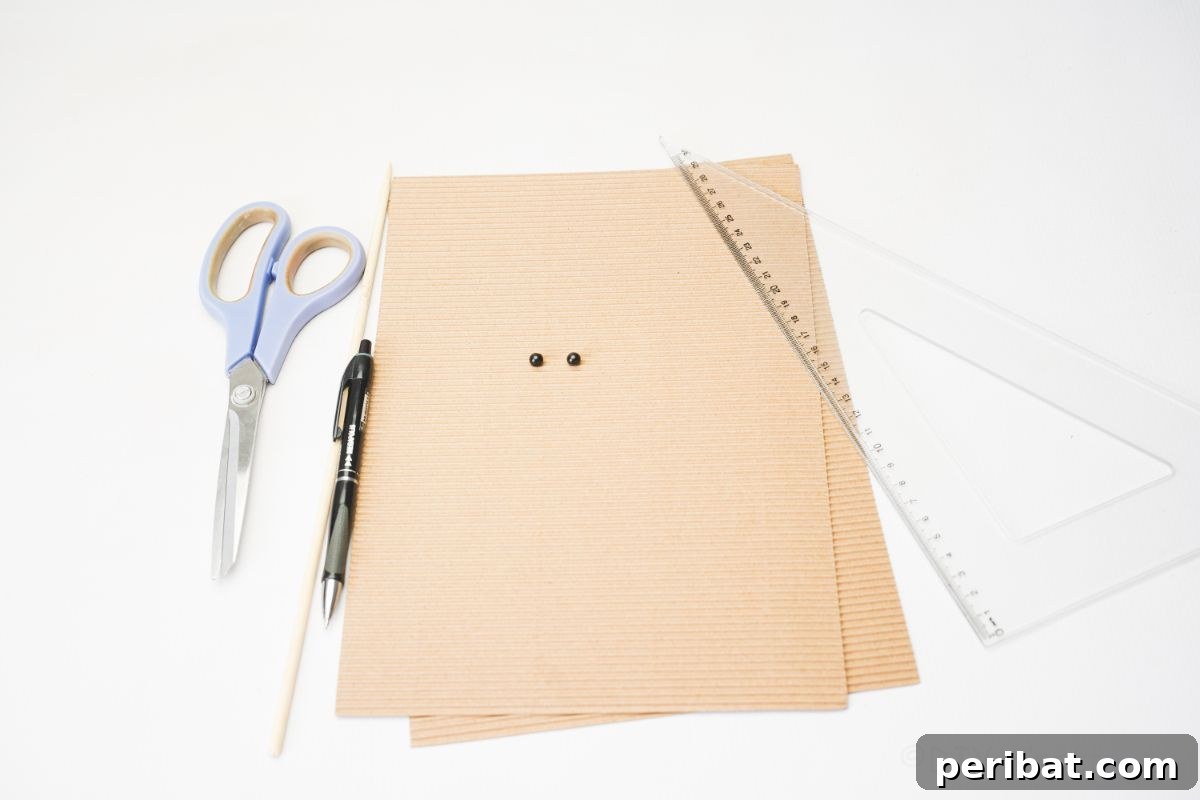 Rustic Rolled Cardboard Owl Art 7 cardboard scissors and marker on white table