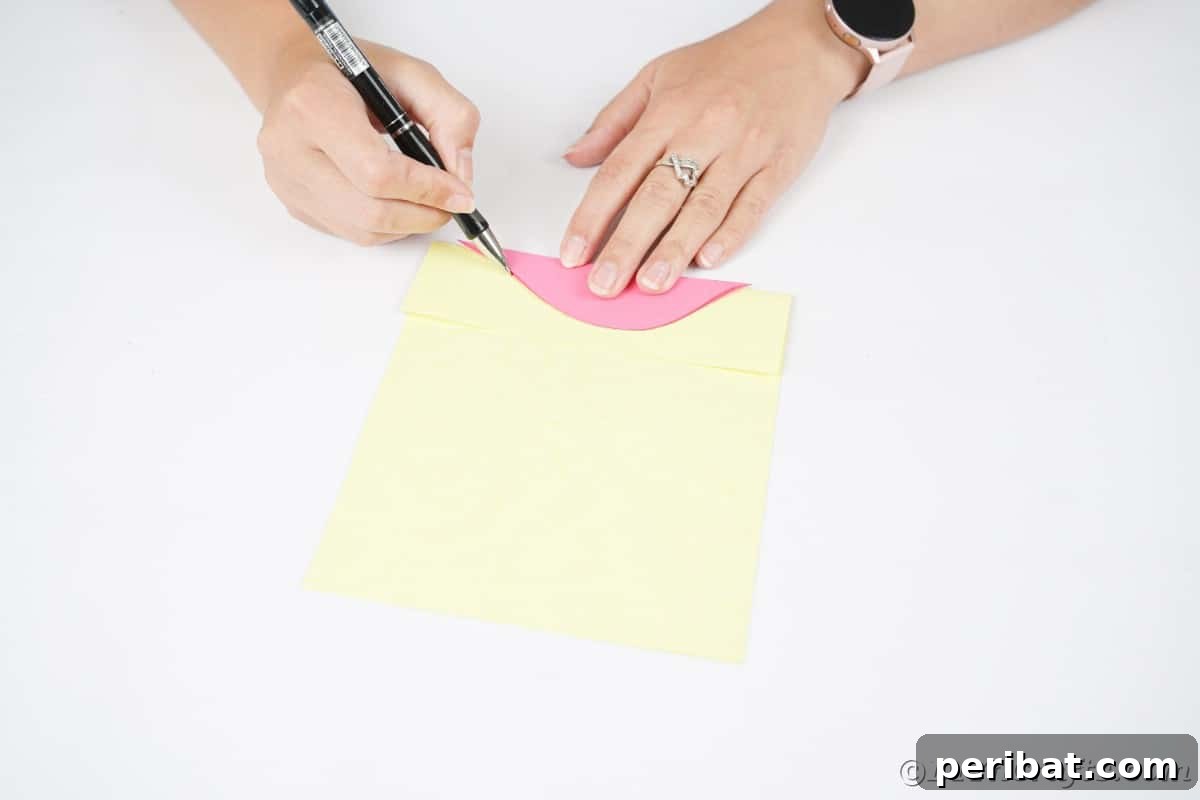 Tracing shape onto yellow paper