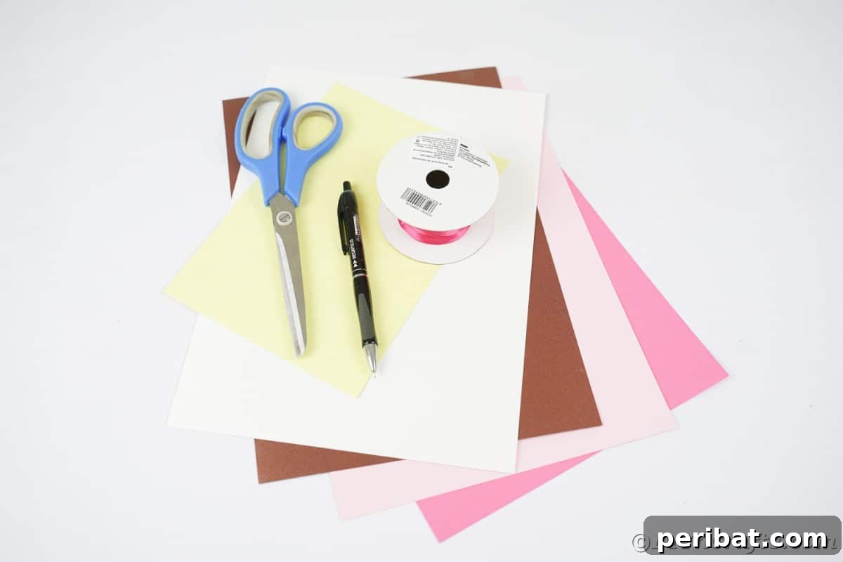 Whimsical Paper Evergreen Decor 8 Craft paper and sharp scissors laid out on a table, ready for beginning a DIY Christmas ornament project