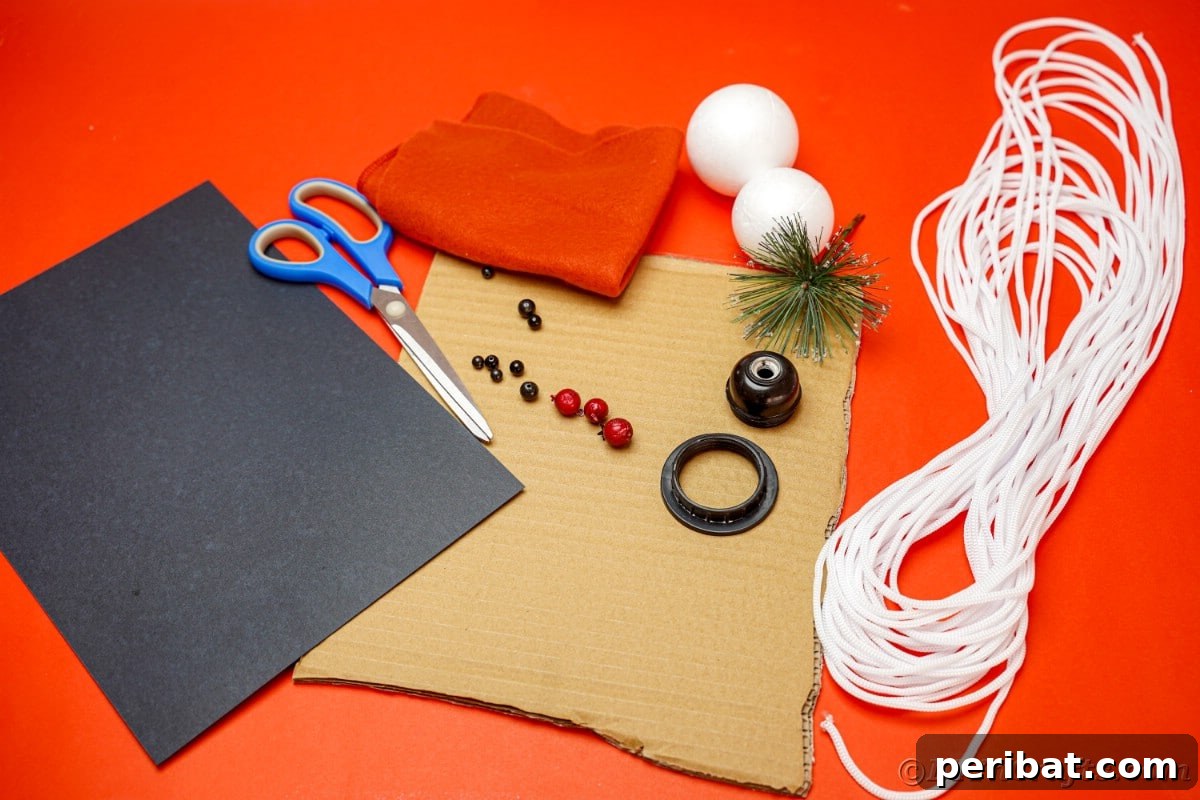 Cozy Twine Snowman Christmas Charm 8 rope styrofoam balls and black paper on red table