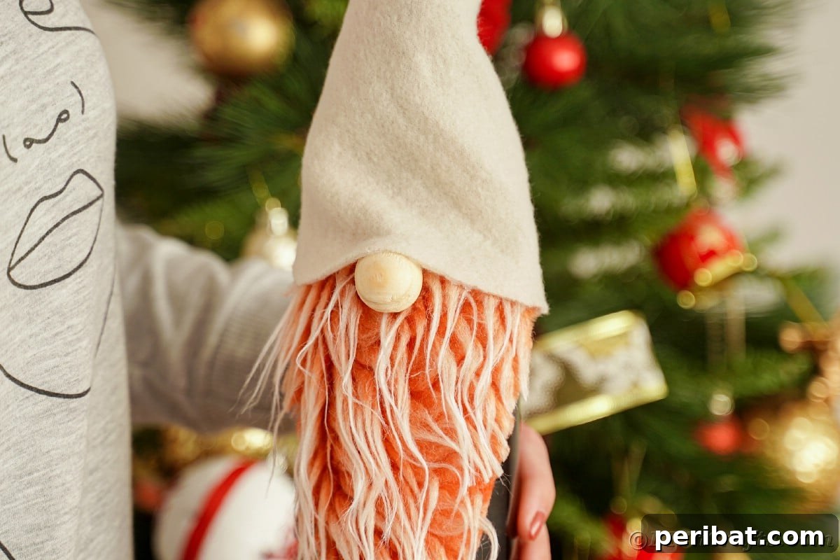 A lady proudly holding a wine bottle adorned with a charming gnome cover in front of a festive Christmas tree.