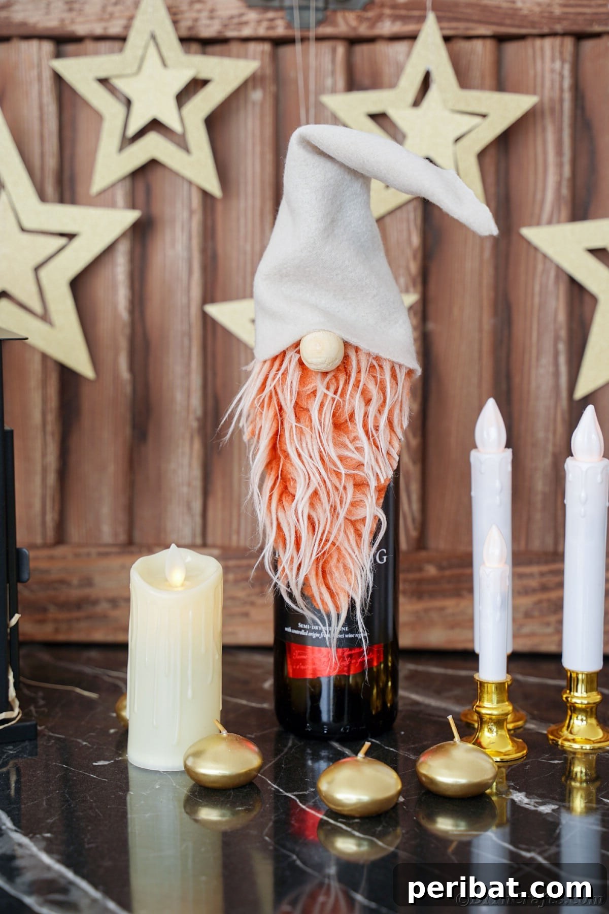 A charming gnome-adorned wine bottle sits on a table illuminated by candles, creating a warm, inviting ambiance.
