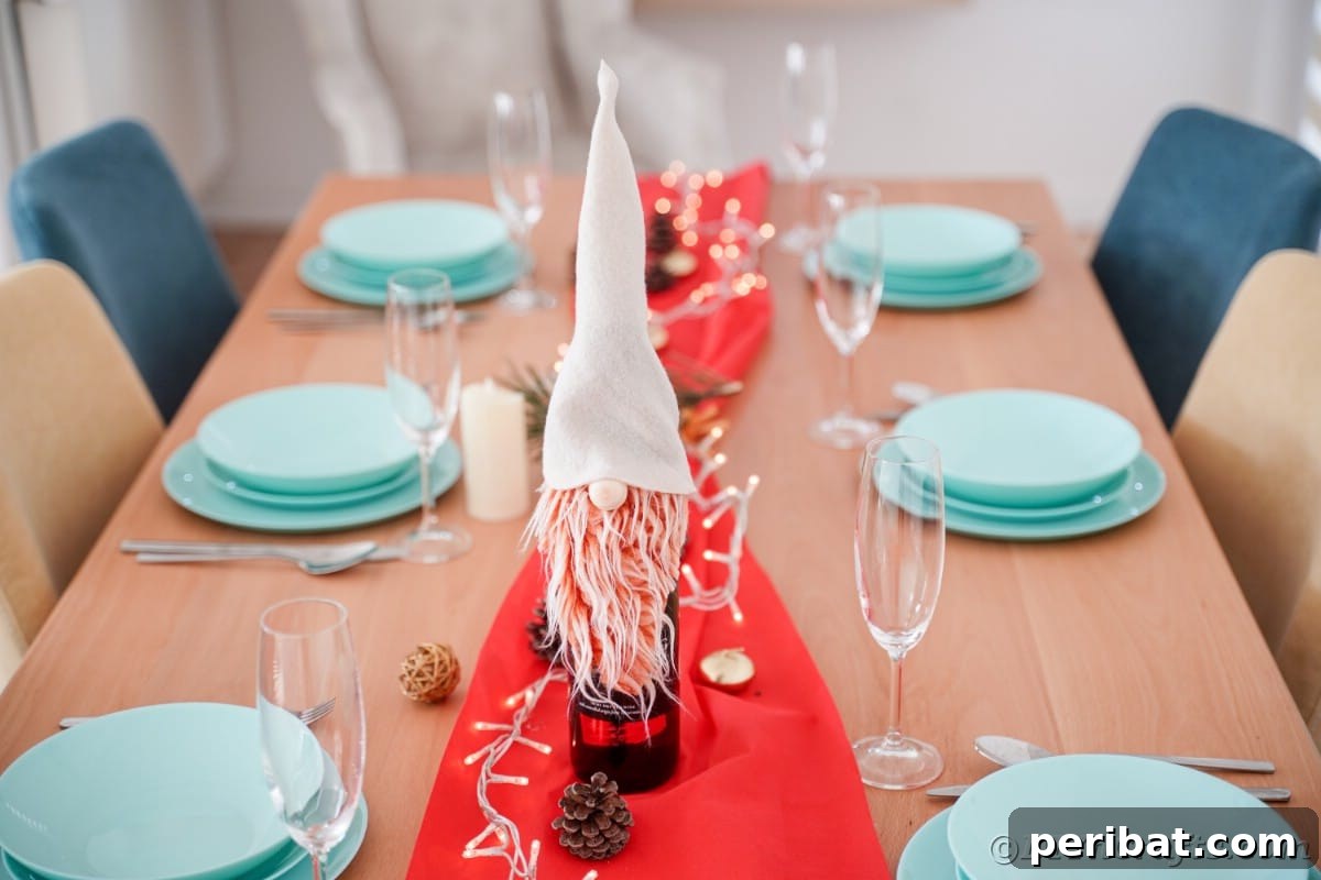 Teal place settings with a red table runner, featuring a gnome-covered wine bottle as a festive centerpiece.