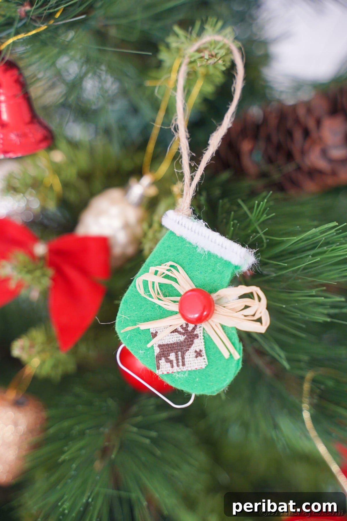 green felt ice skate ornament hanging on christmas tree