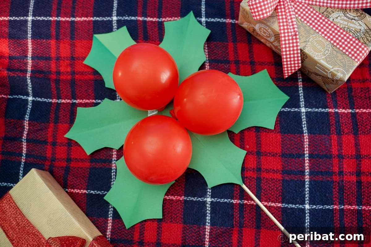 Oversized Holly Berry and Leaf Festive Decor 3 giant holly leaves with berries on plaid fabric