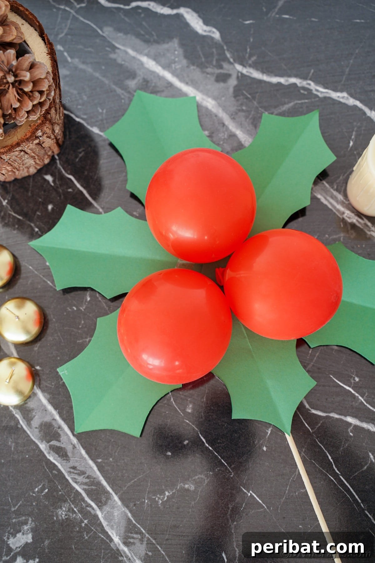 Oversized Holly Berry and Leaf Festive Decor 25 giant holly leaf decoration on black marble
