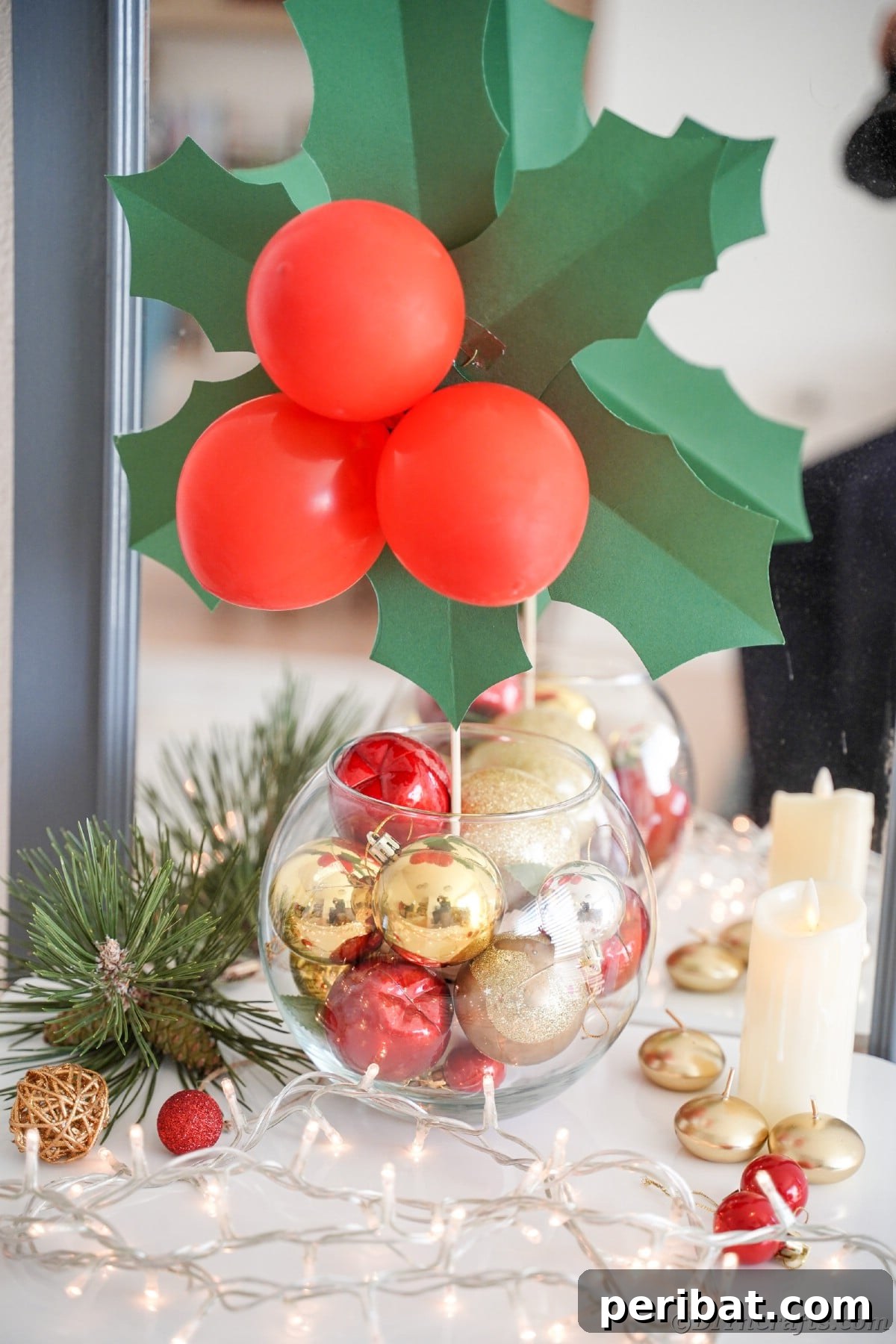 Oversized Holly Berry and Leaf Festive Decor 6 large fake berry and leaf decoration in glass bowl on table