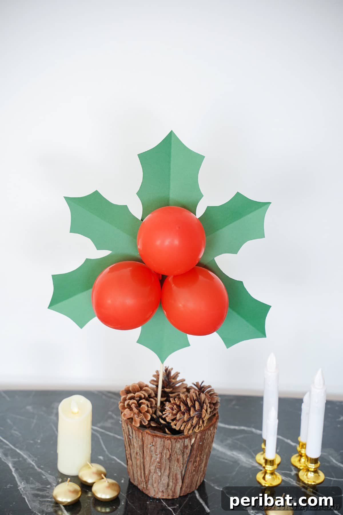 Oversized Holly Berry and Leaf Festive Decor 8 giant holly and berry decoration in bucket with pinecones