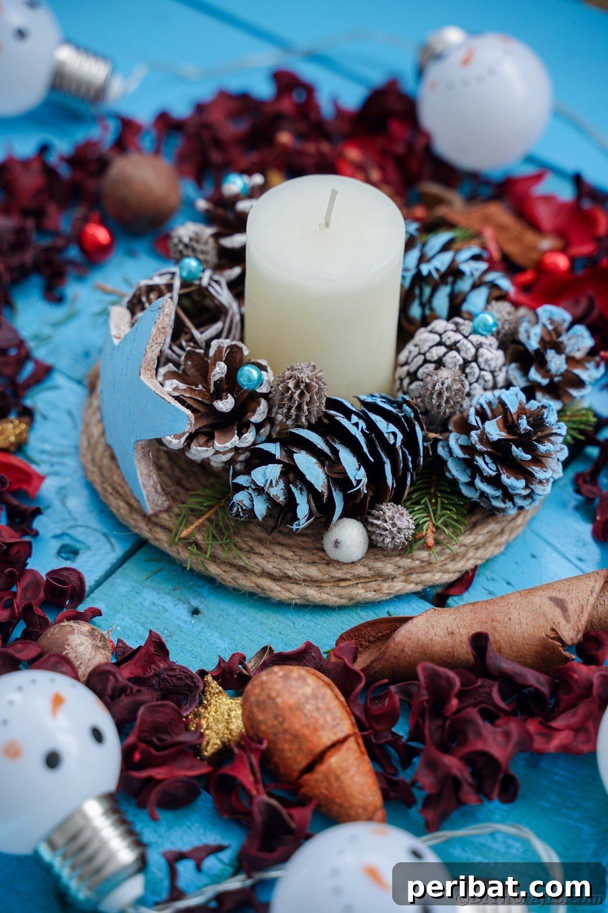 Cozy Farmhouse Christmas Candle Centerpiece 15 rustic candle holder with white candle in center on blue table