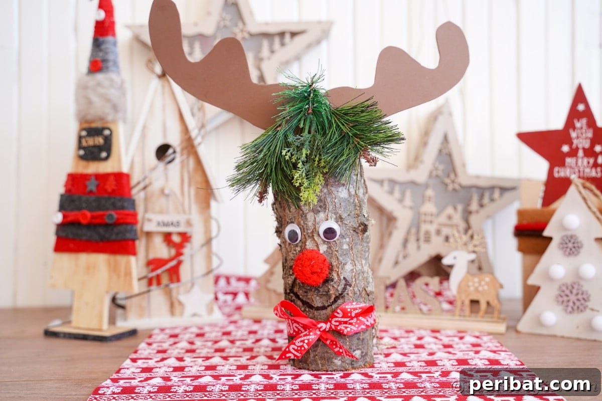 Whimsical Woodland Log Reindeer Decor 5 log with antlers and red nose on table with red and white paper