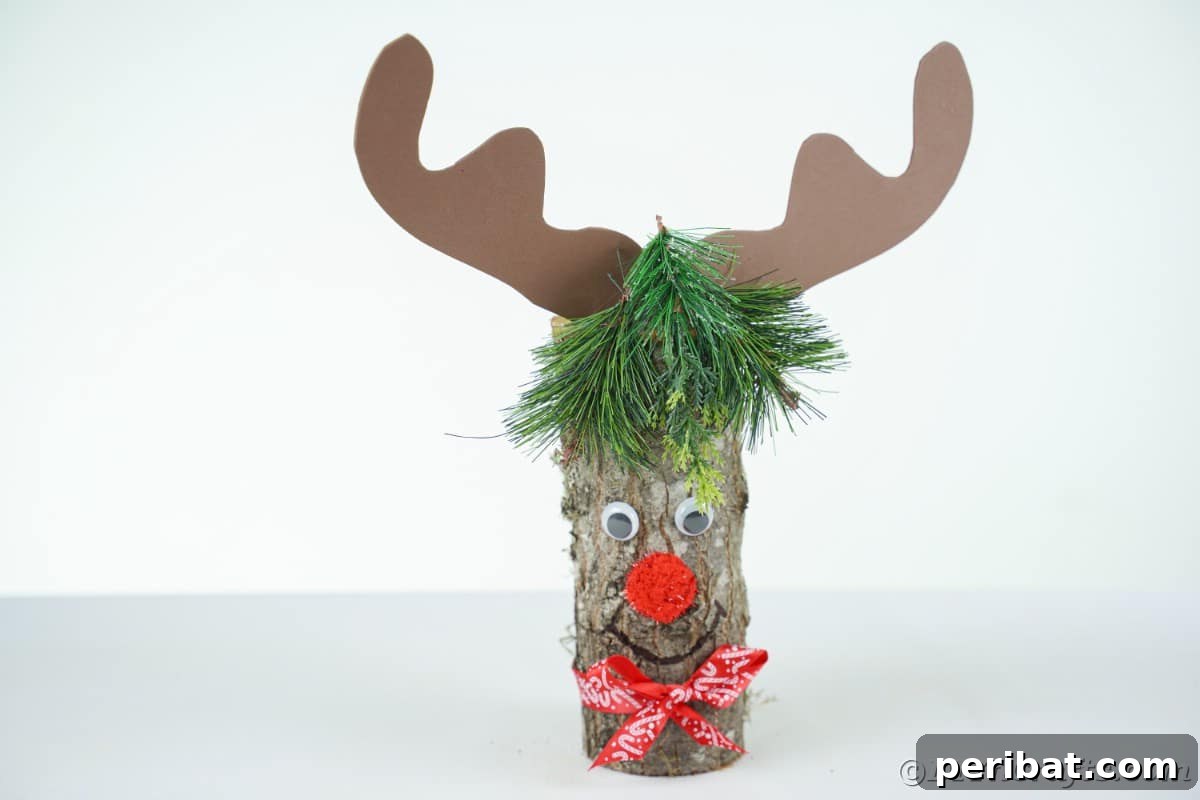 Whimsical Woodland Log Reindeer Decor 7 log rudolf reindeer on table