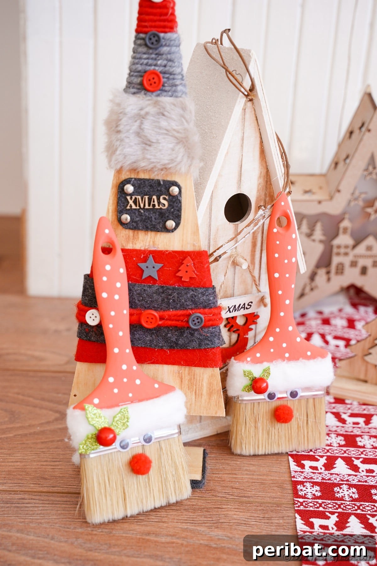 A rustic wooden tree ornament stands on a table, with a charming paintbrush Santa Claus decoration placed thoughtfully in front, creating a heartwarming holiday scene.