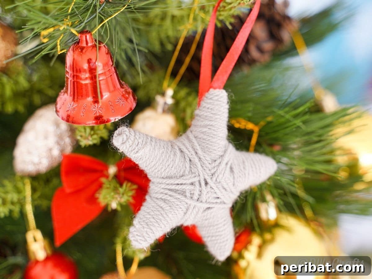 Charming Rustic Yarn Star Tree Ornament 13 star ornament hanging on Christmas tree