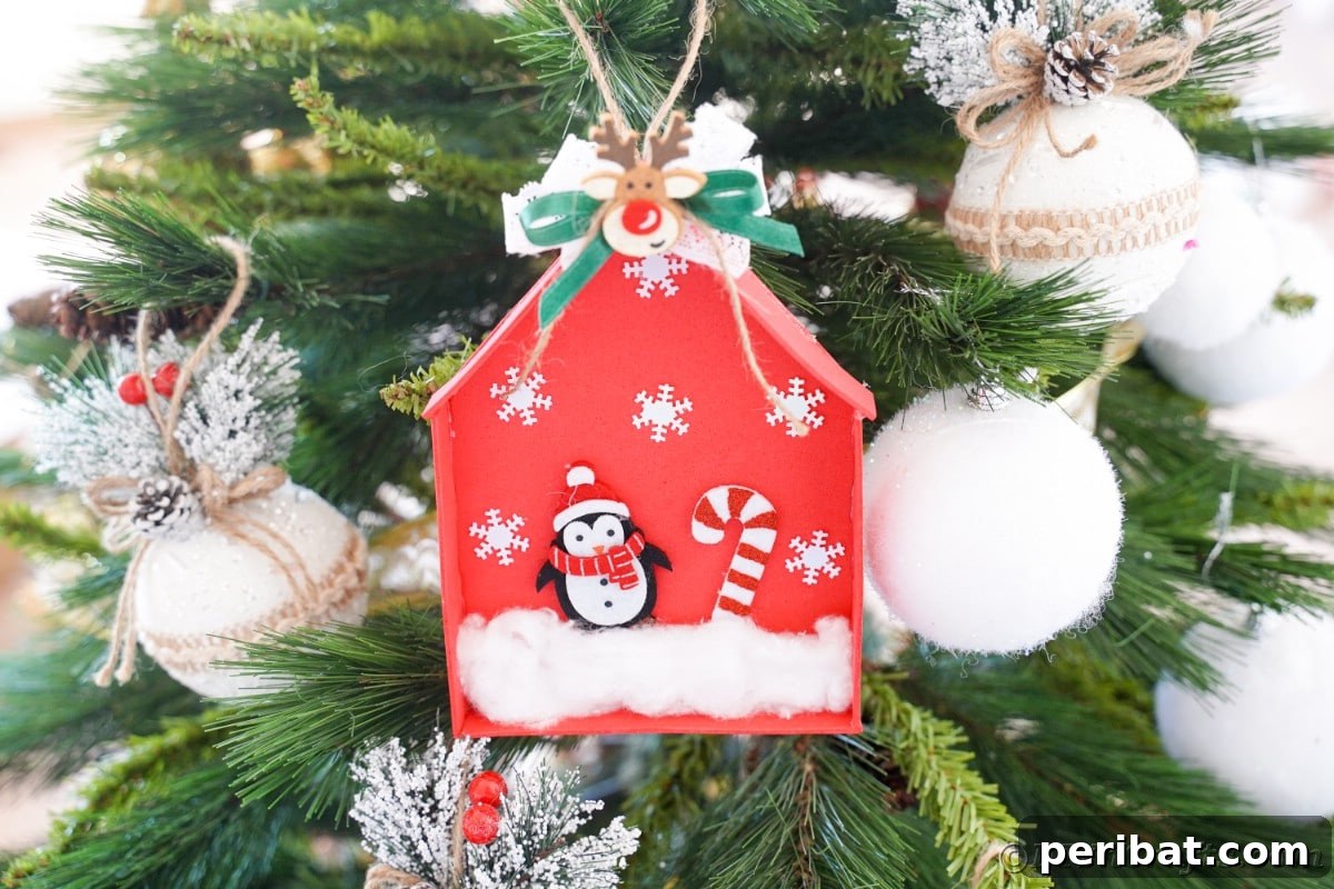Whimsical Foam Penguin House Tree Ornament 17 A beautifully crafted red foam penguin house ornament hanging gracefully on a festive Christmas tree