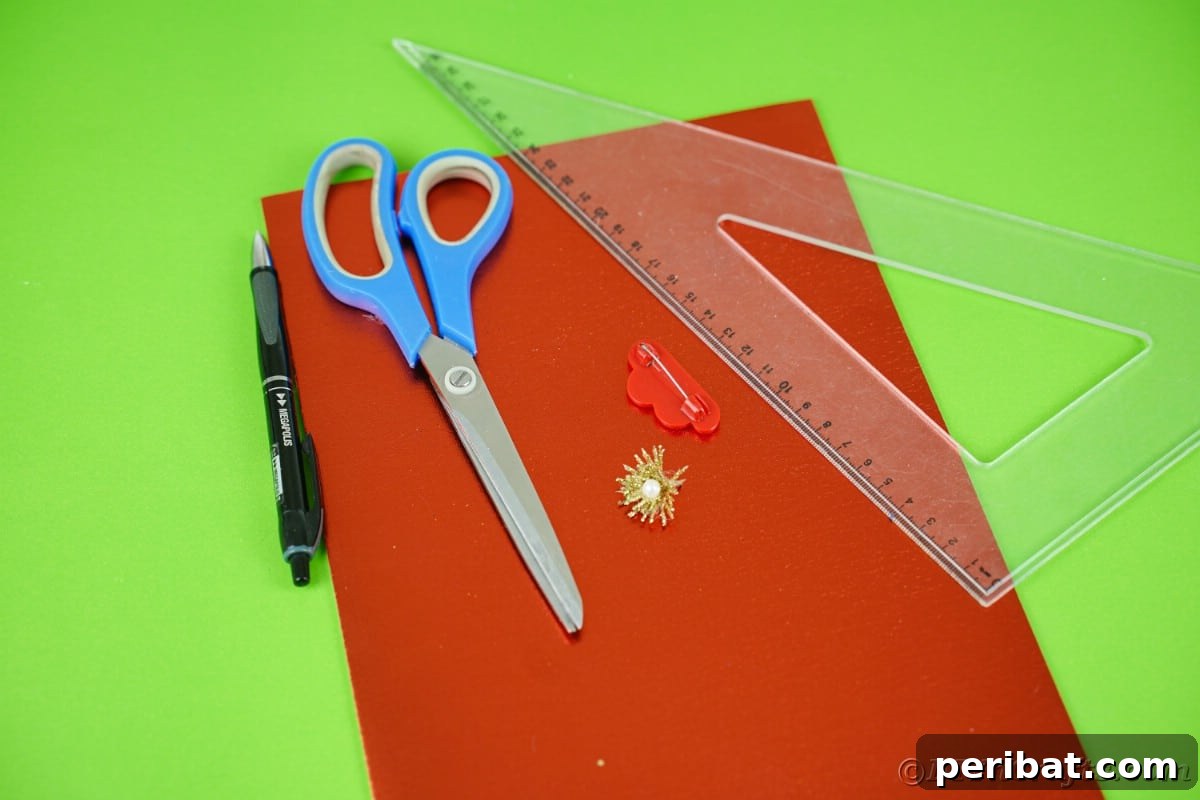 Craft Your Own Foam Poinsettia Brooch or Festive Ornament 8 Red foam paper on green table with blue scissors and ruler