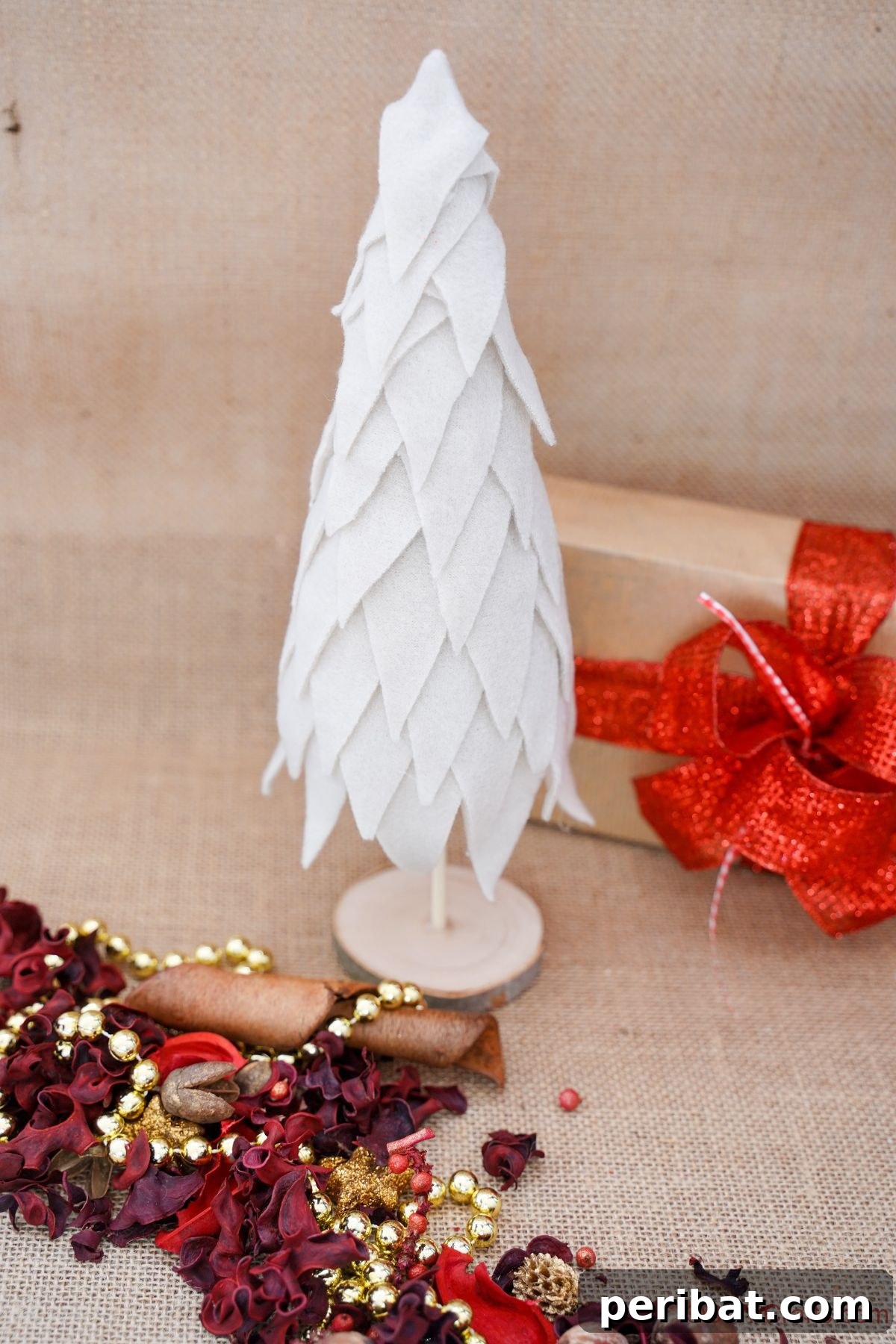 Cozy Upcycled Sweater Christmas Tree 18 cream fabric christmas tree on wood table with holiday decor