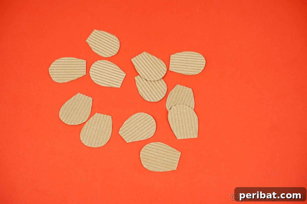 cardboard shingles on red table