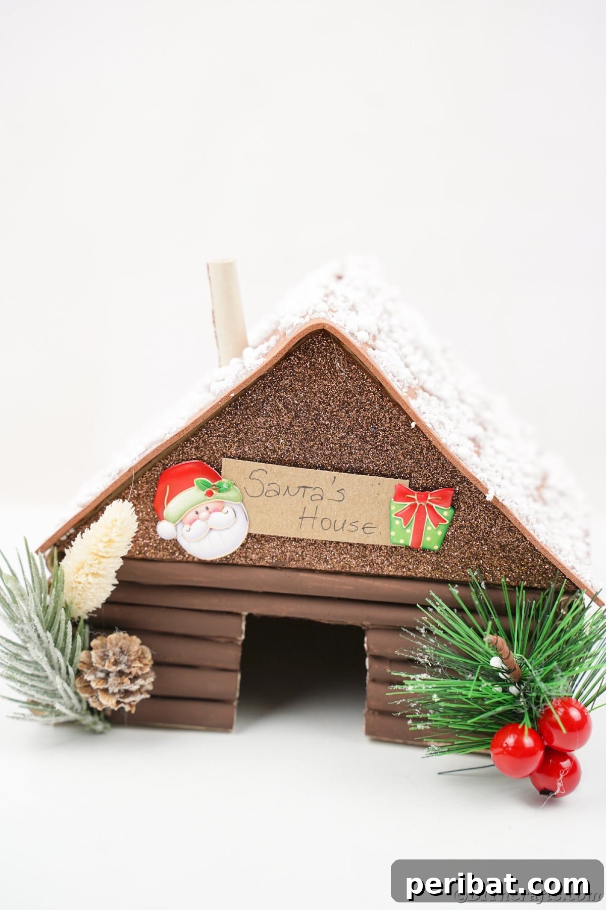rustic log cabin miniature sitting on white table