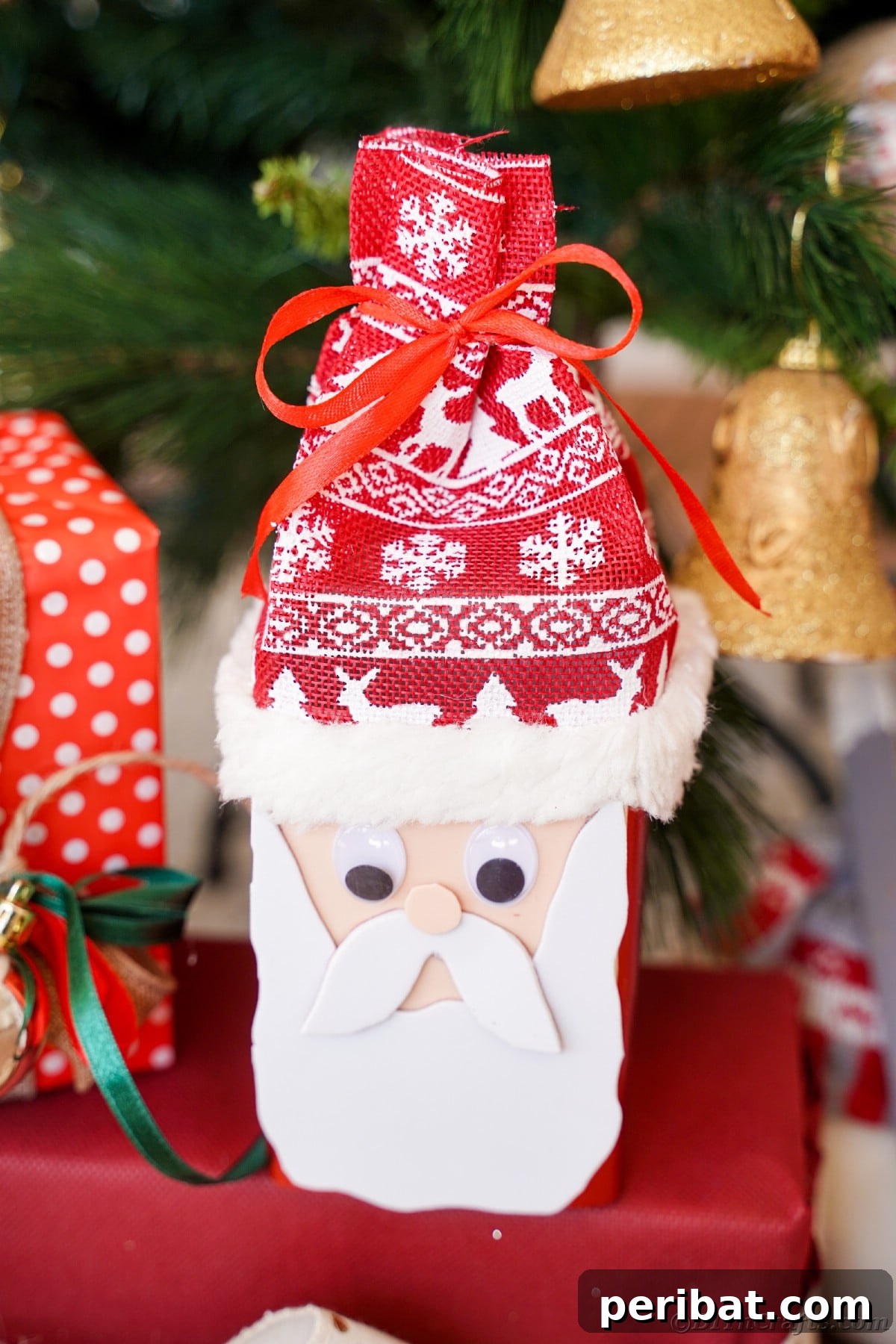 Jolly Upcycled Milk Carton Santa Candy Box 2 Santa Claus with Nordic hat in front of holiday tree, a homemade candy box craft