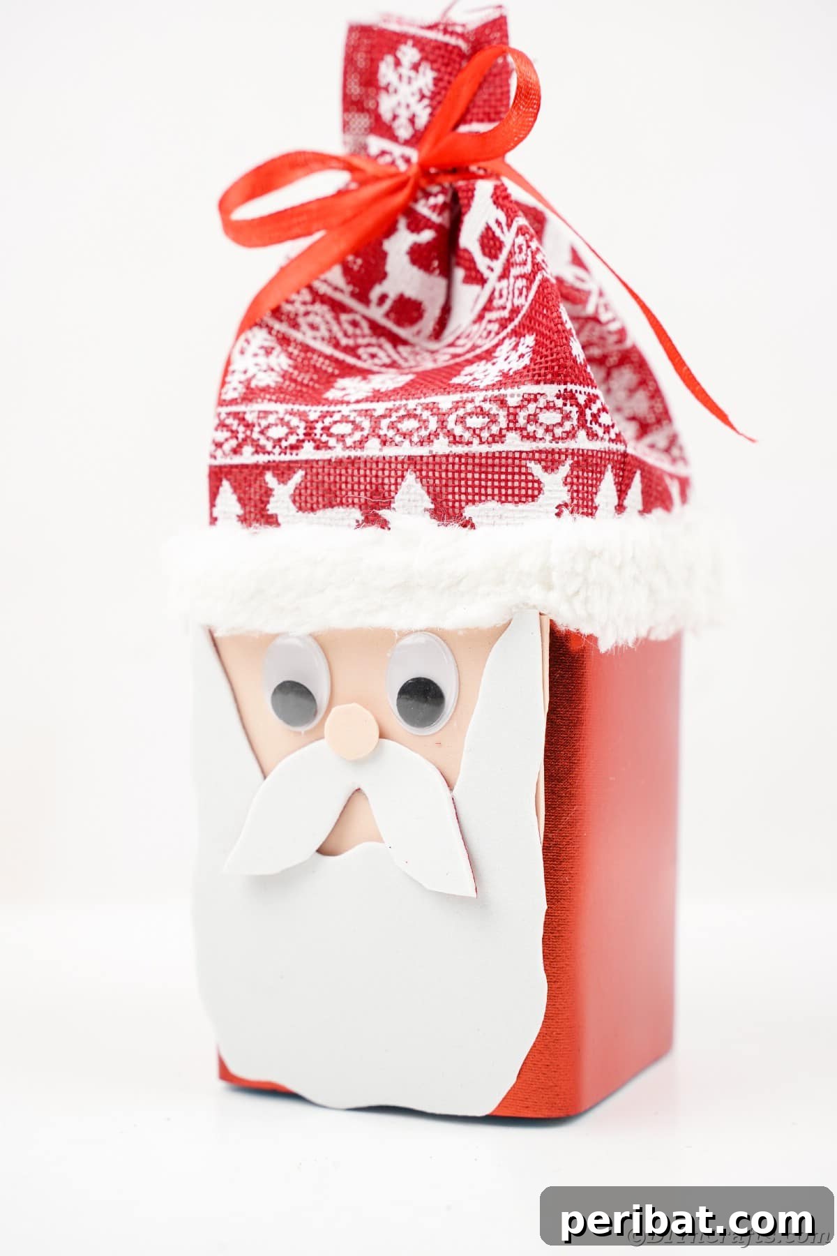 Jolly Upcycled Milk Carton Santa Candy Box 20 Standing Santa Claus box with a Nordic hat on a white table, showcasing the completed craft