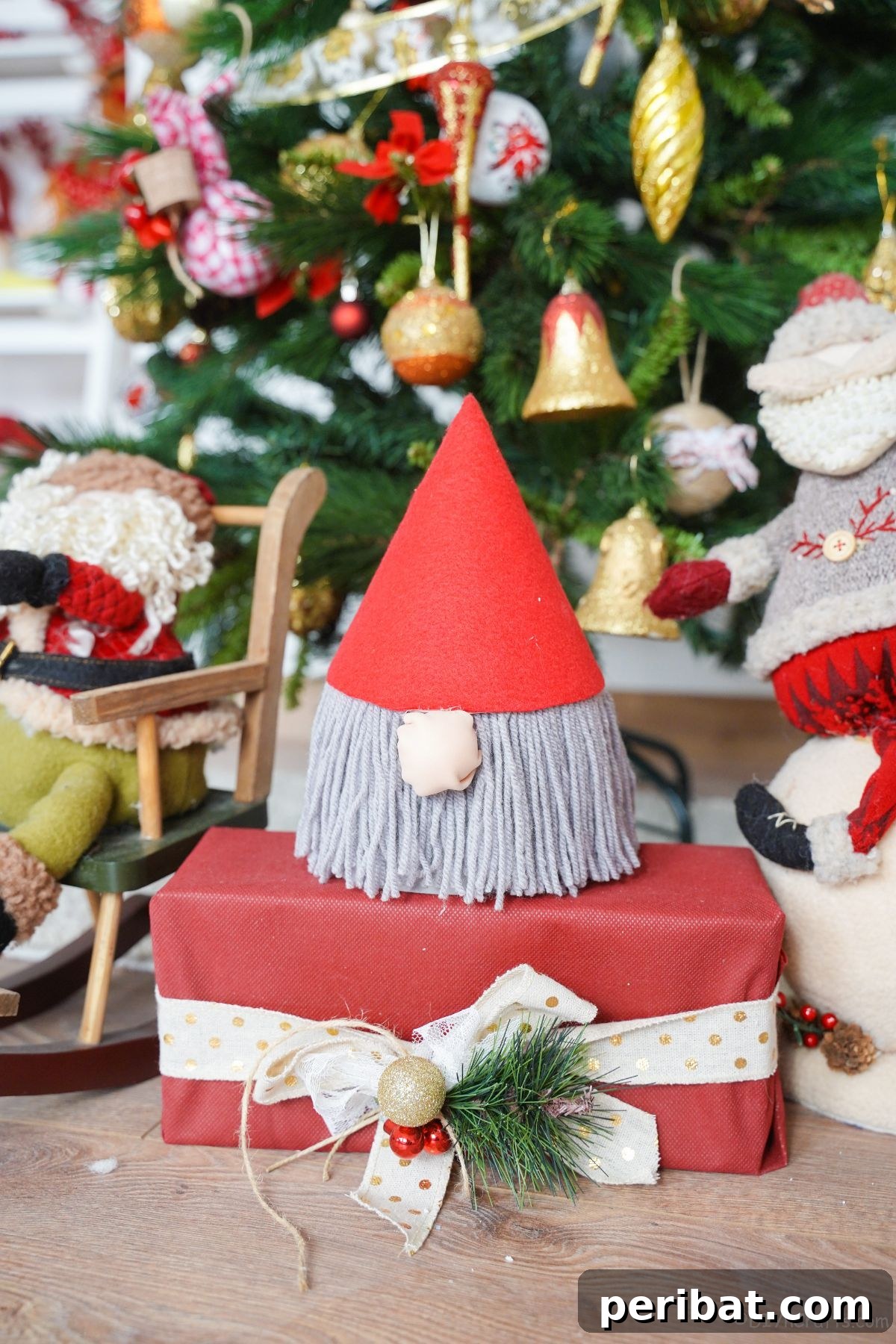 gnome with gray beard on top of red package