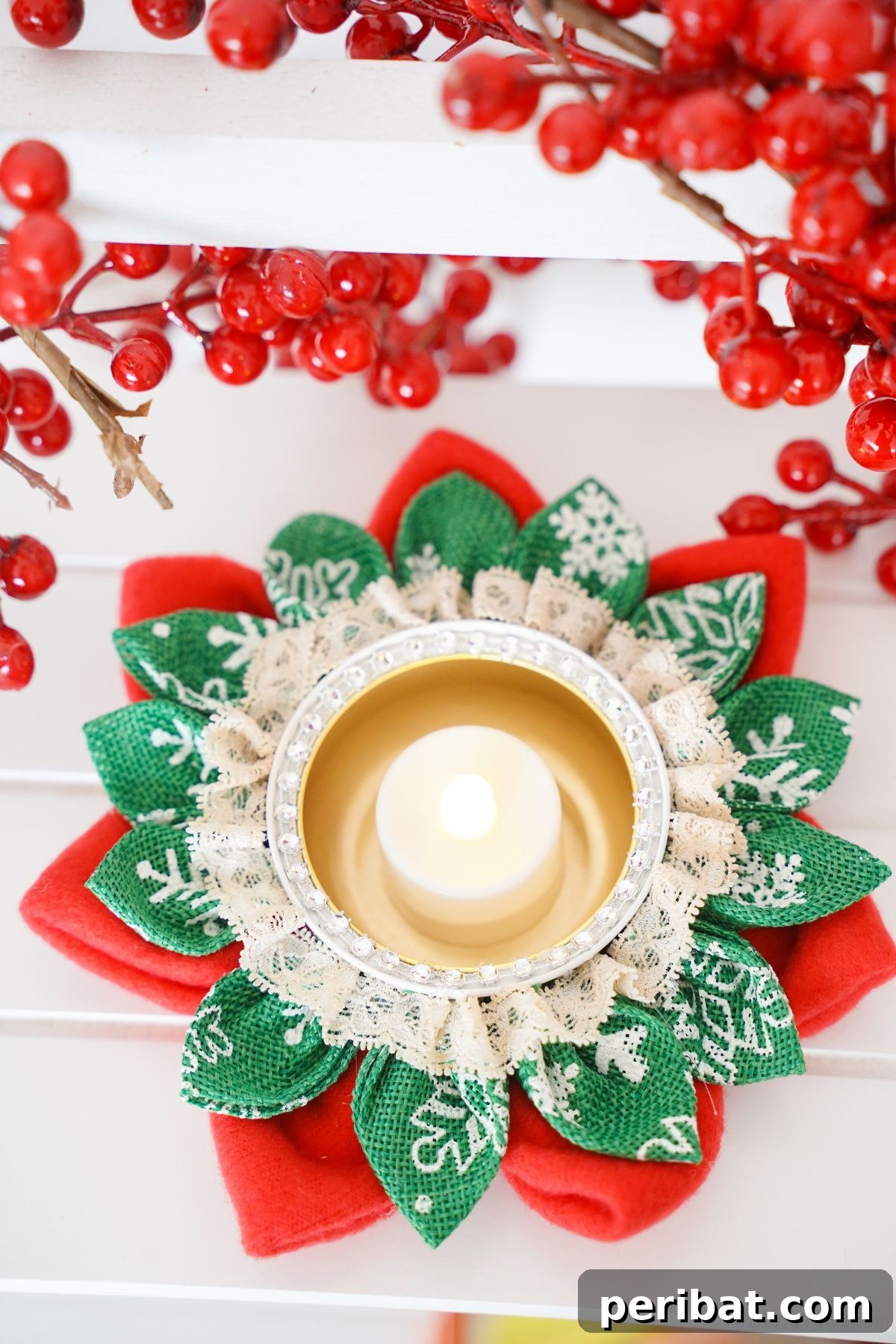 Festive Fabric Floral Candle Centerpiece 4 candle holder on white table with fake berries