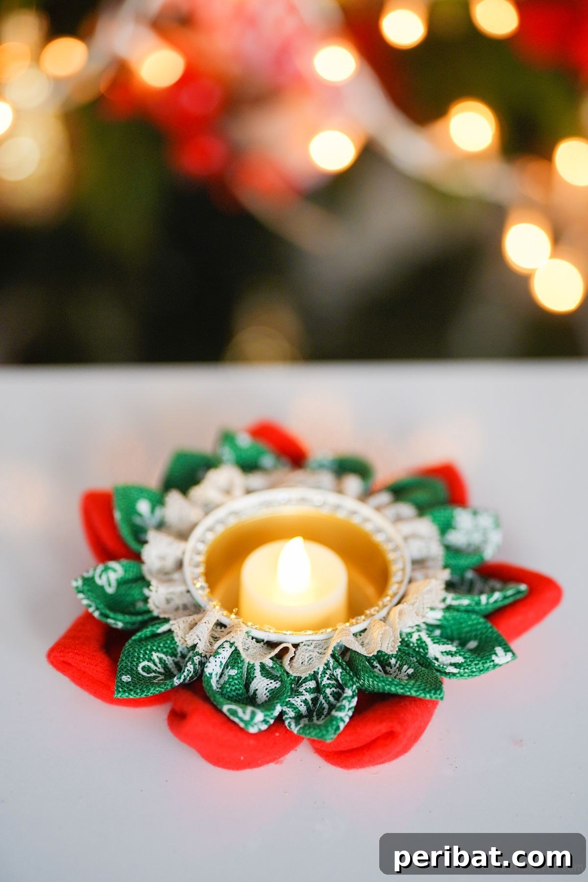 Festive Fabric Floral Candle Centerpiece 14 christmas candle holder on table by Christmas tree