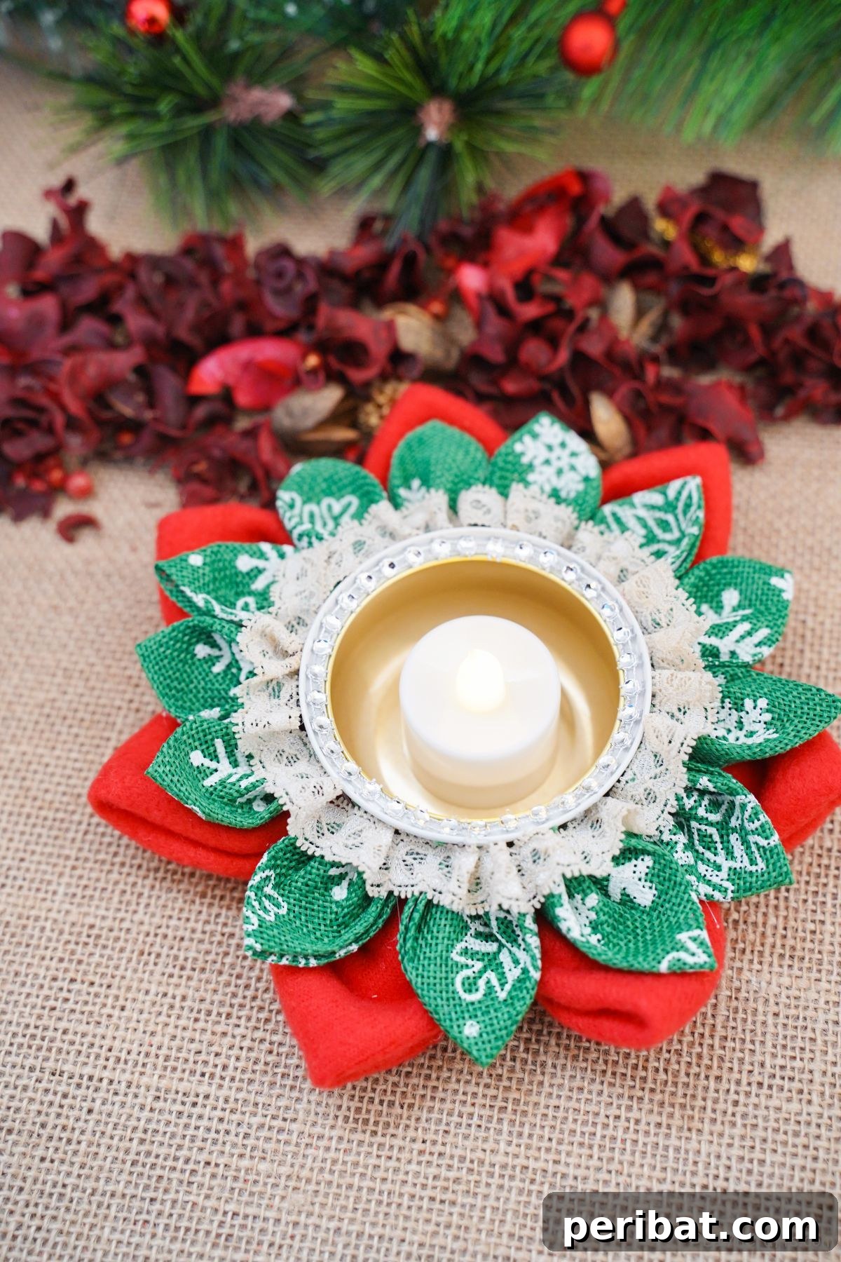 Festive Fabric Floral Candle Centerpiece 15 red and green flower shaped candle holder on burlap by red potpourri