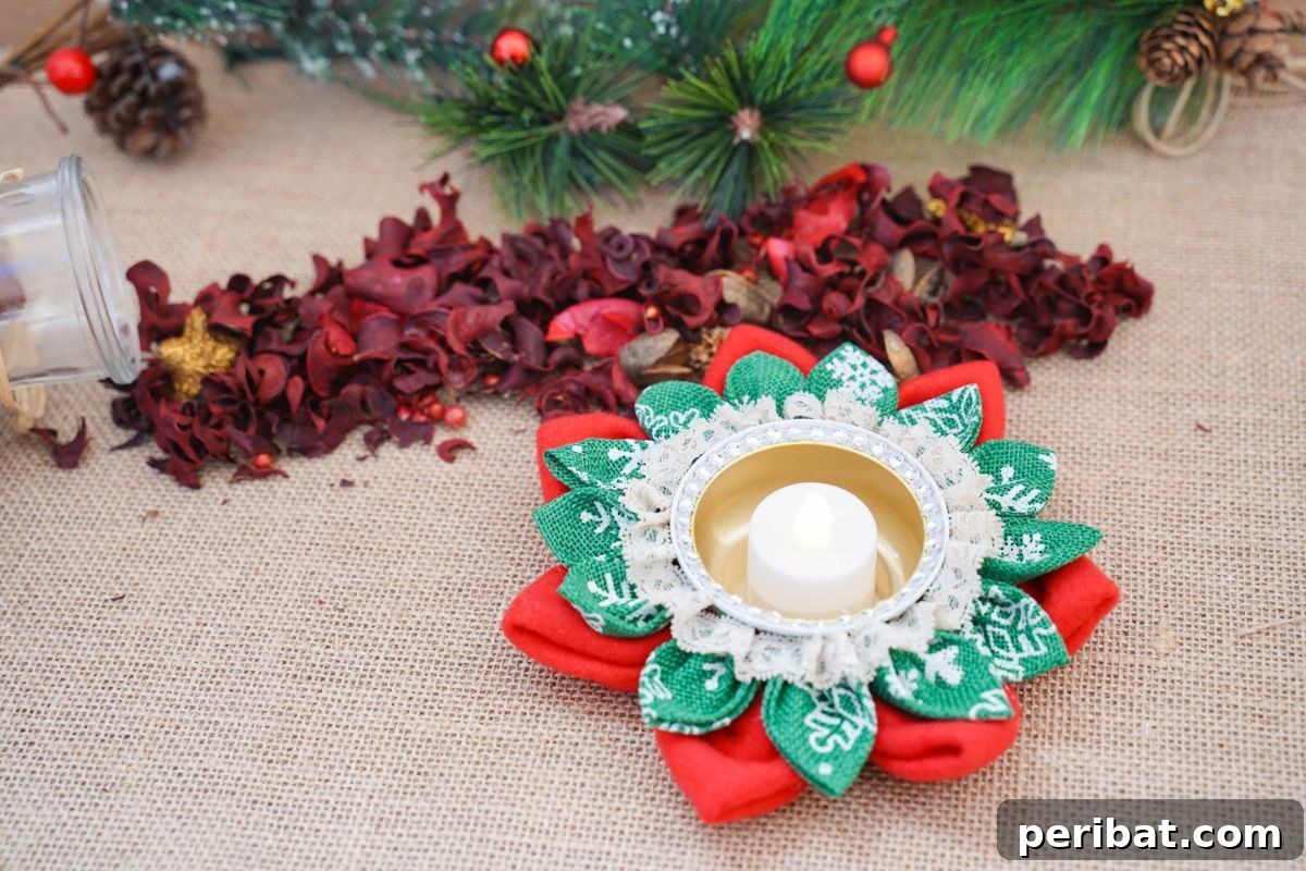 Festive Fabric Floral Candle Centerpiece 5 fabric flower candle holder on burlap by potpourri and greenery