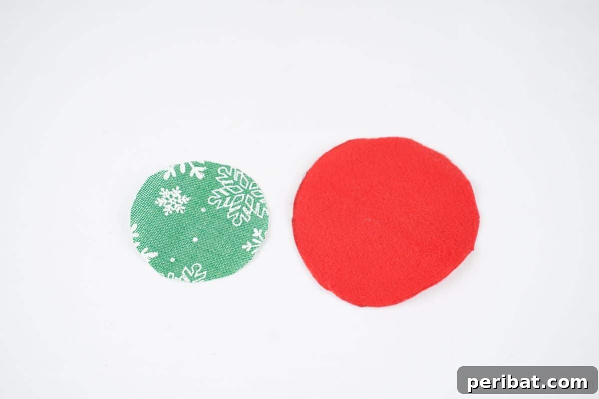 Festive Fabric Floral Candle Centerpiece 9 green and red fabric circles on white table