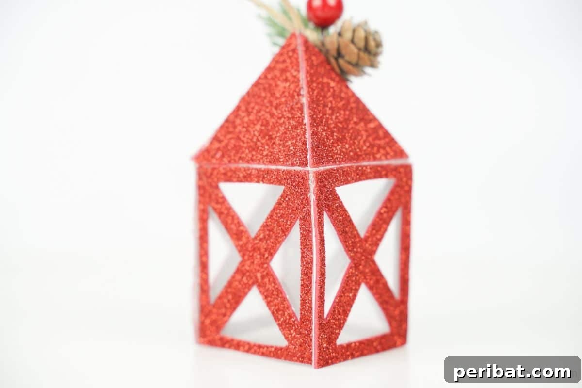 red glitter lantern on white table