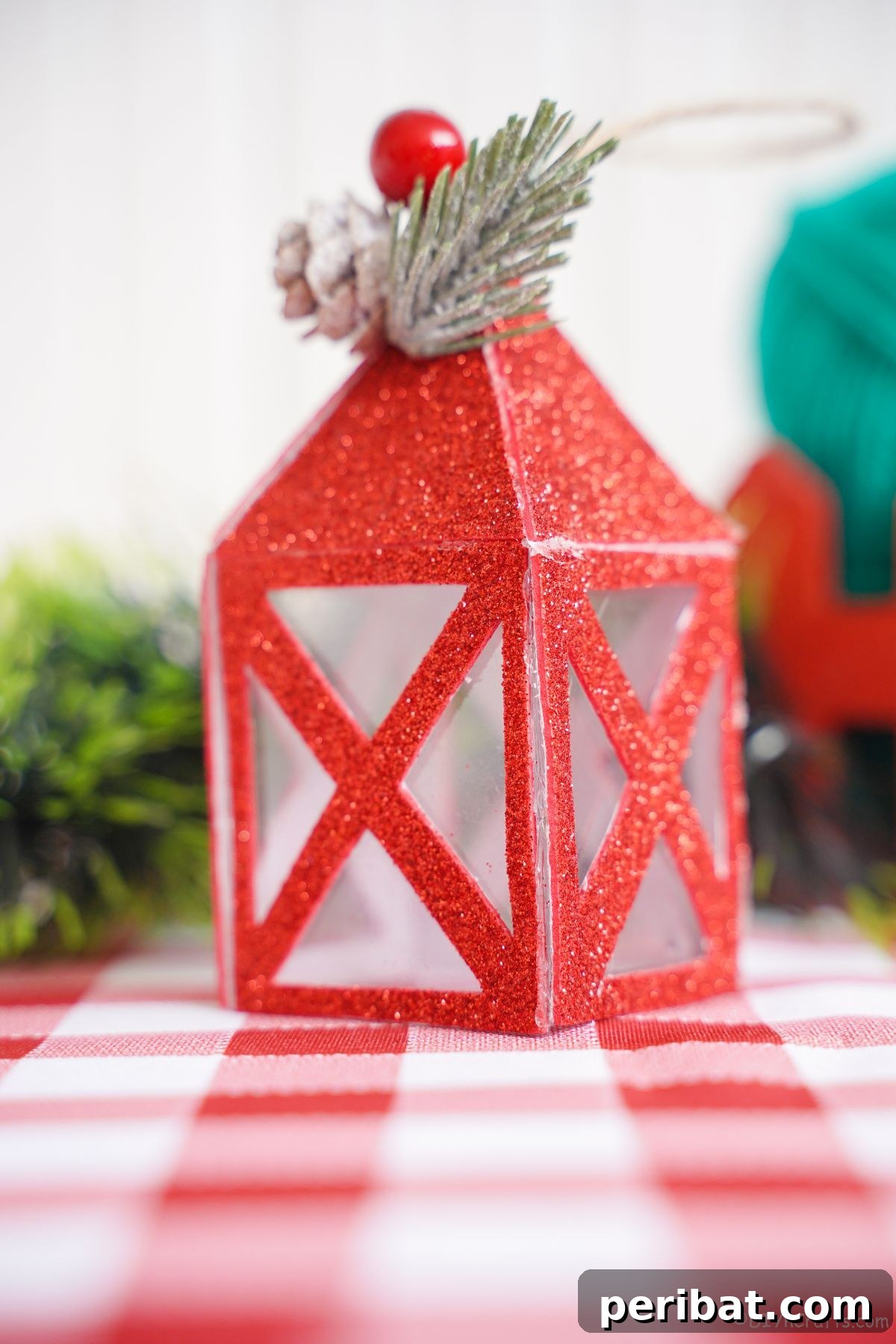 red paper lantern on red checked tablecloth