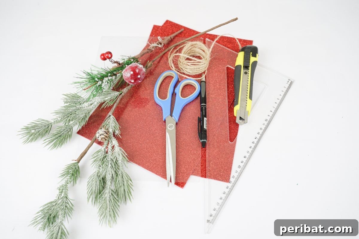 red glitter paper fake berries scissors and craft knife on white table