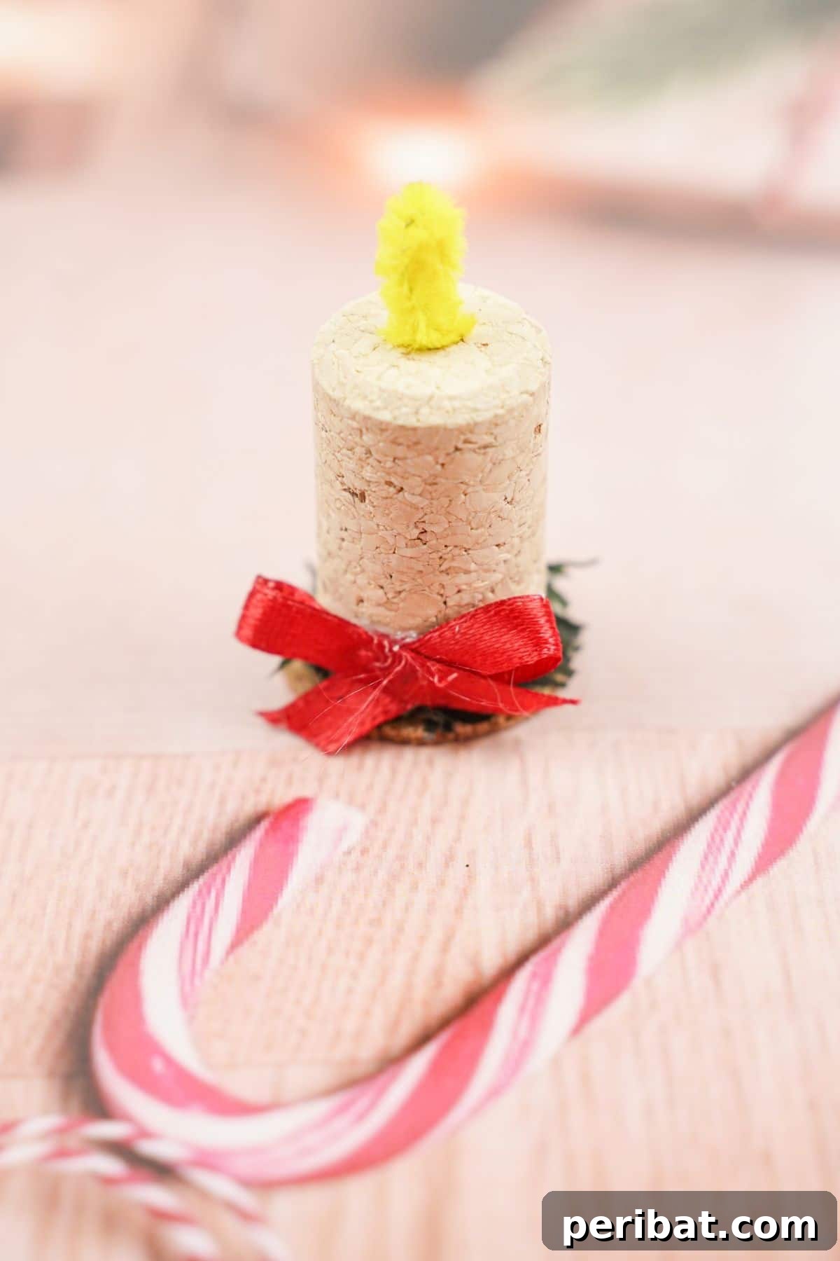 Crafted Wine Cork Candle Accents 17 wien cork candle on holiady themed paper with candy cane